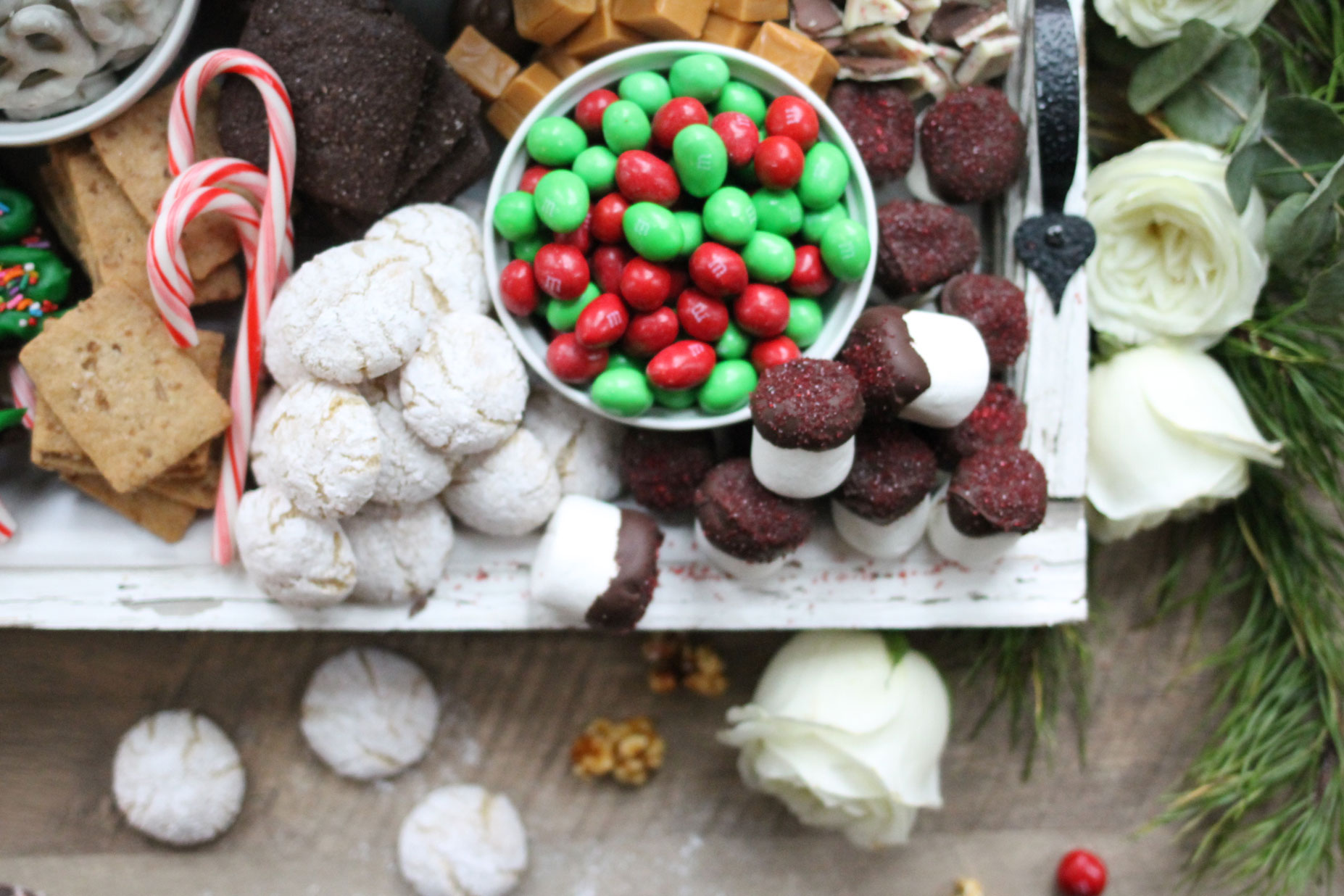 How to make the ultimate dessert snack board for the holidays; a.k.a., a sweet charcuterie spread. | glitterinc.com | @glitterinc - How to Make a Holiday Dessert Charcuterie Board by North Carolina foodie blogger Glitter, Inc.