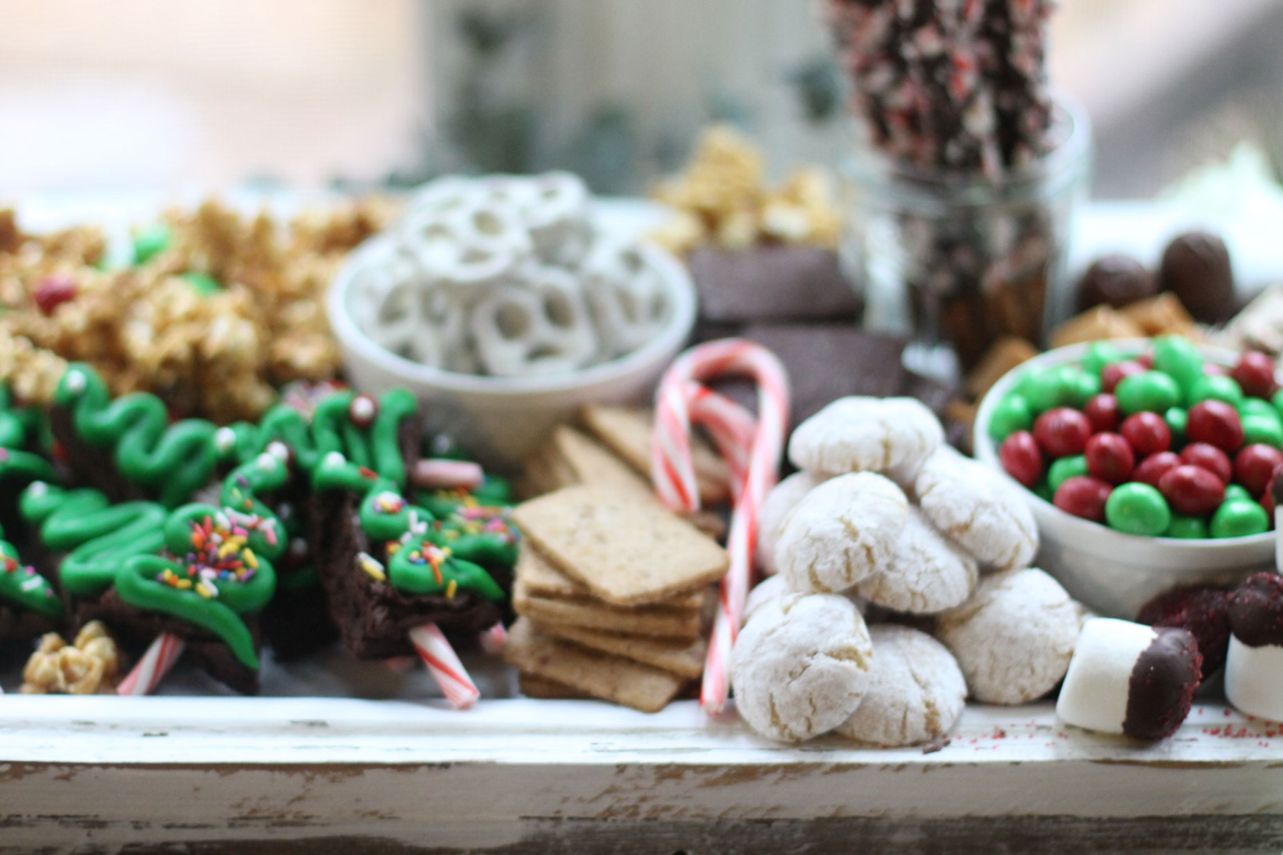 How to make the ultimate dessert snack board for the holidays; a.k.a., a sweet charcuterie spread. | glitterinc.com | @glitterinc