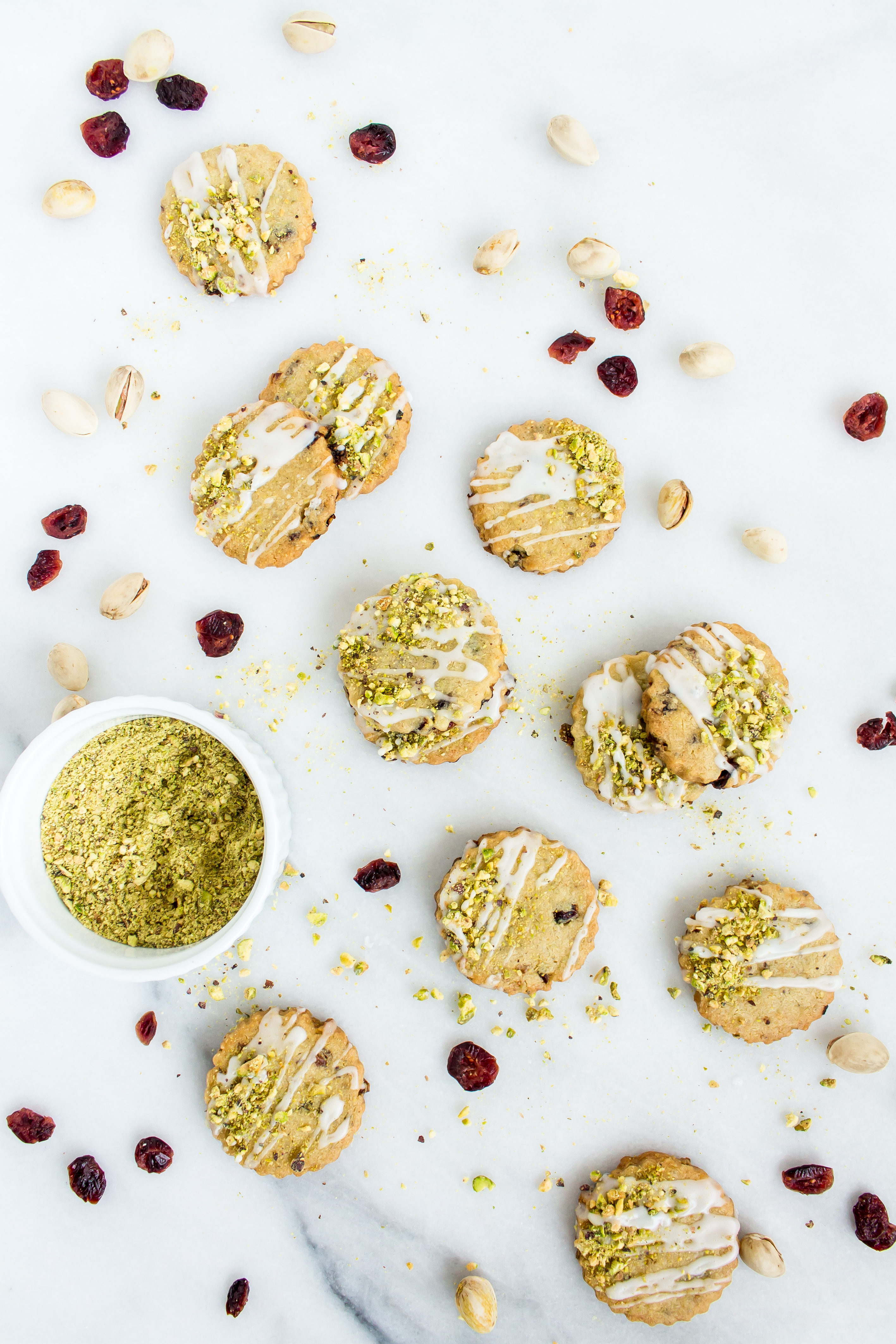 Looking for an incredible new favorite shortbread recipe? Look no further than these frosted pistachio cranberry shortbread cookies! | glitterinc.com | @glitterinc - Frosted Pistachio Cranberry Shortbread Cookies Recipe by North Carolina foodie blogger Glitter, Inc.