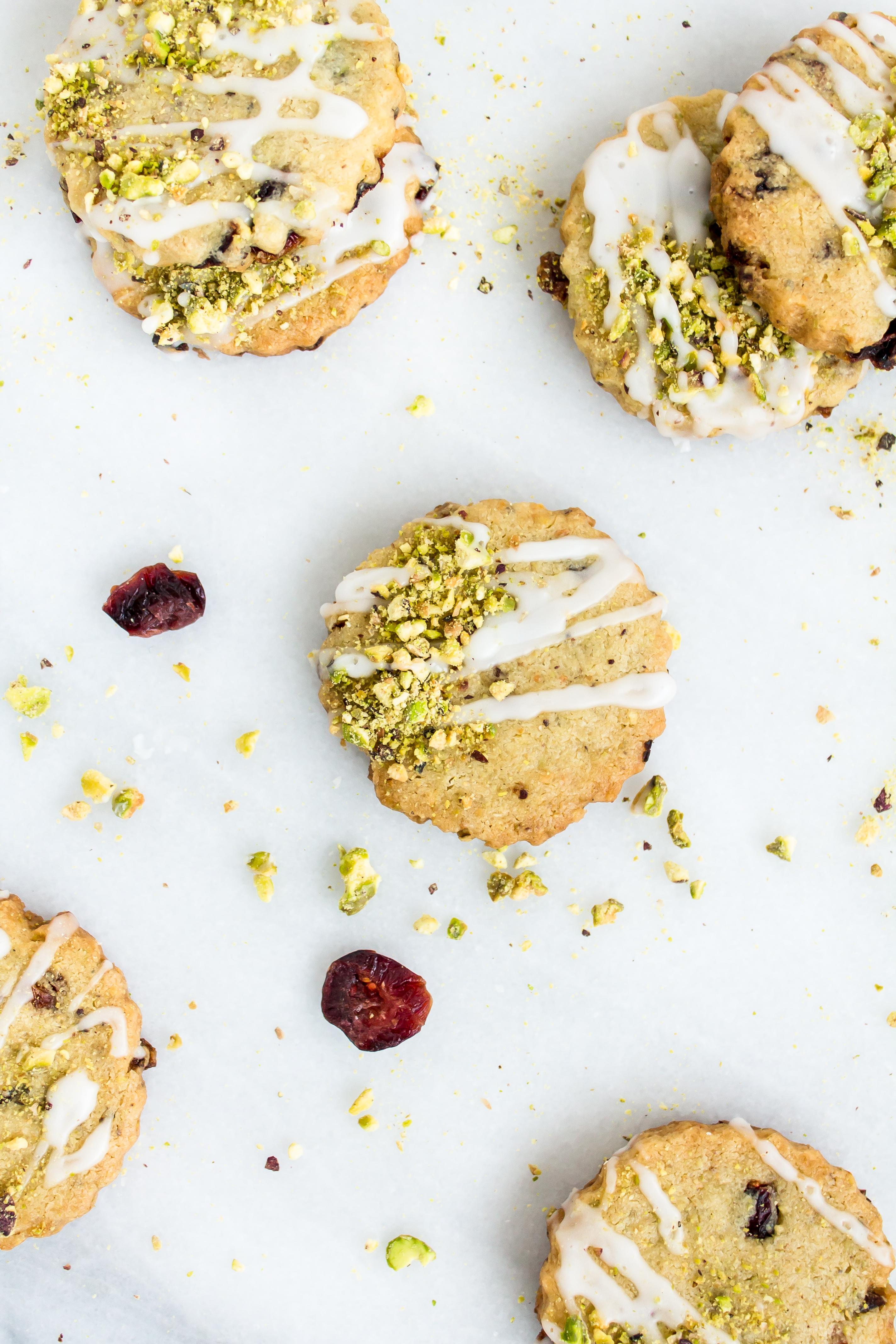 Looking for an incredible new favorite shortbread recipe? Look no further than these frosted pistachio cranberry shortbread cookies! | glitterinc.com | @glitterinc - Frosted Pistachio Cranberry Shortbread Cookies Recipe by North Carolina foodie blogger Glitter, Inc.