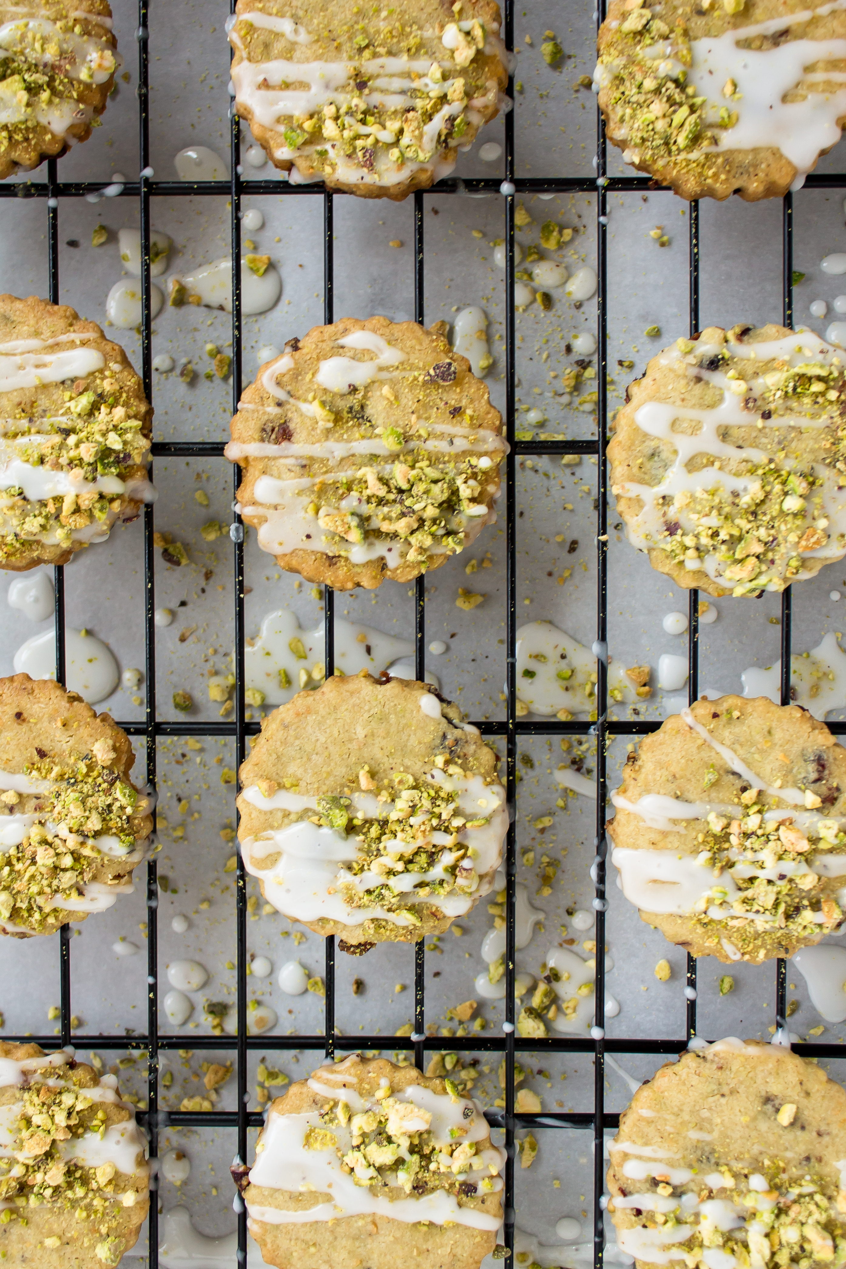 Looking for an incredible new favorite shortbread recipe? Look no further than these frosted pistachio cranberry shortbread cookies! | glitterinc.com | @glitterinc - Frosted Pistachio Cranberry Shortbread Cookies Recipe by North Carolina foodie blogger Glitter, Inc.