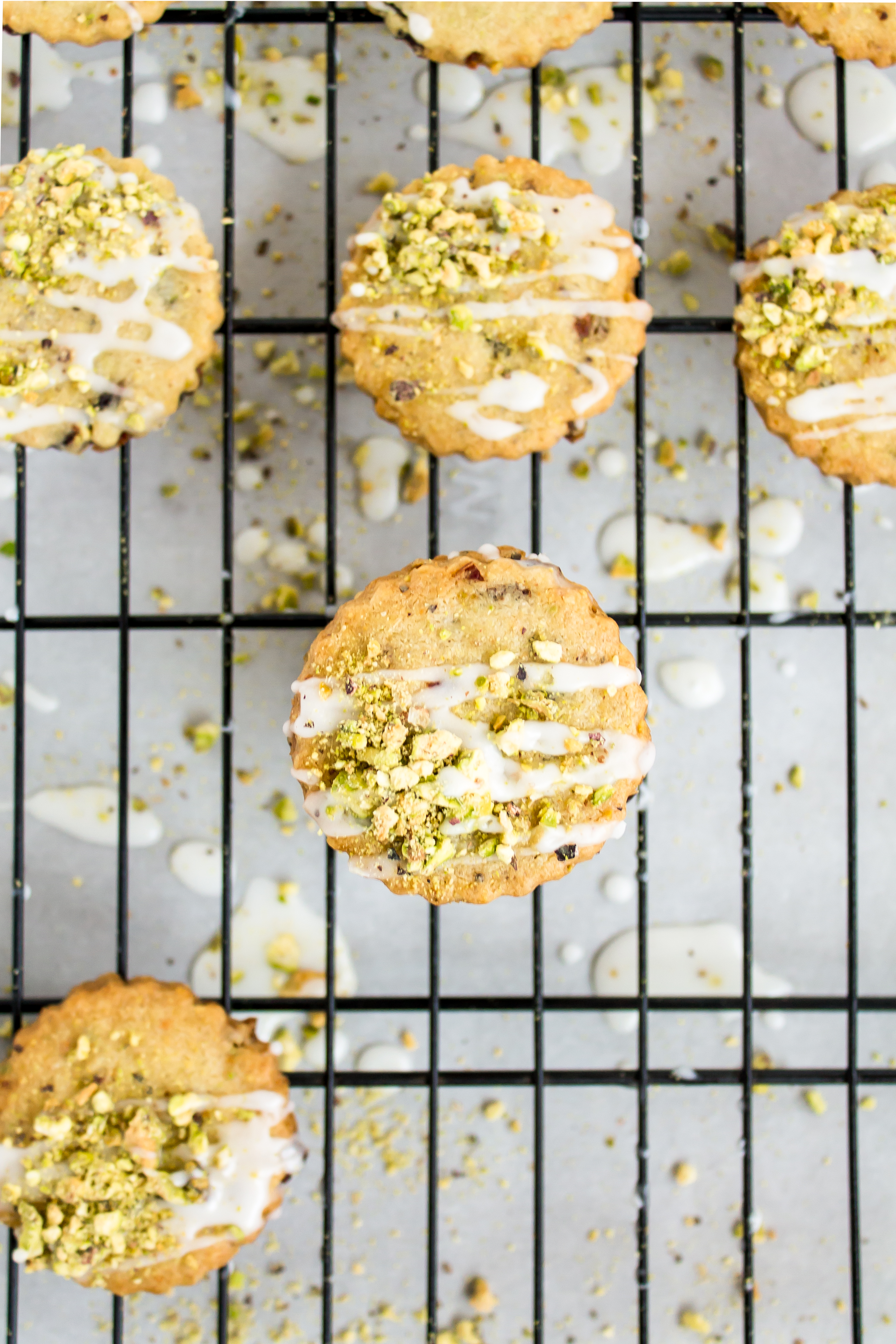 Looking for an incredible new favorite shortbread recipe? Look no further than these frosted pistachio cranberry shortbread cookies! | glitterinc.com | @glitterinc - Frosted Pistachio Cranberry Shortbread Cookies Recipe by North Carolina foodie blogger Glitter, Inc.