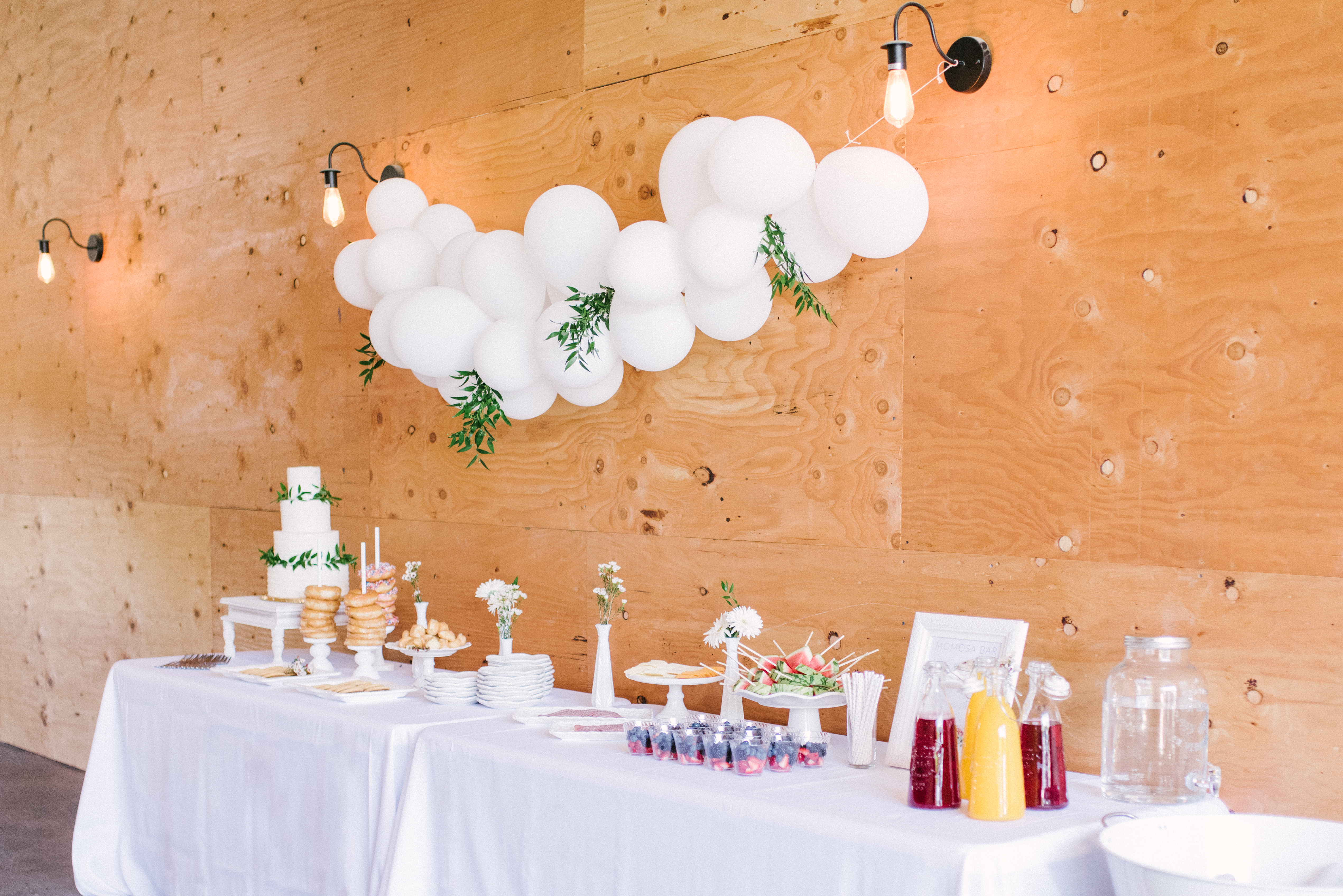 Lovely modern minimalist blush baby shower, set in the coolest industrial farmhouse barn. | glitterinc.com | Hovering Heart Photography | @glitterinc - Modern Minimalist Blush Baby Shower by popular North Carolina style blogger Glitter, Inc.