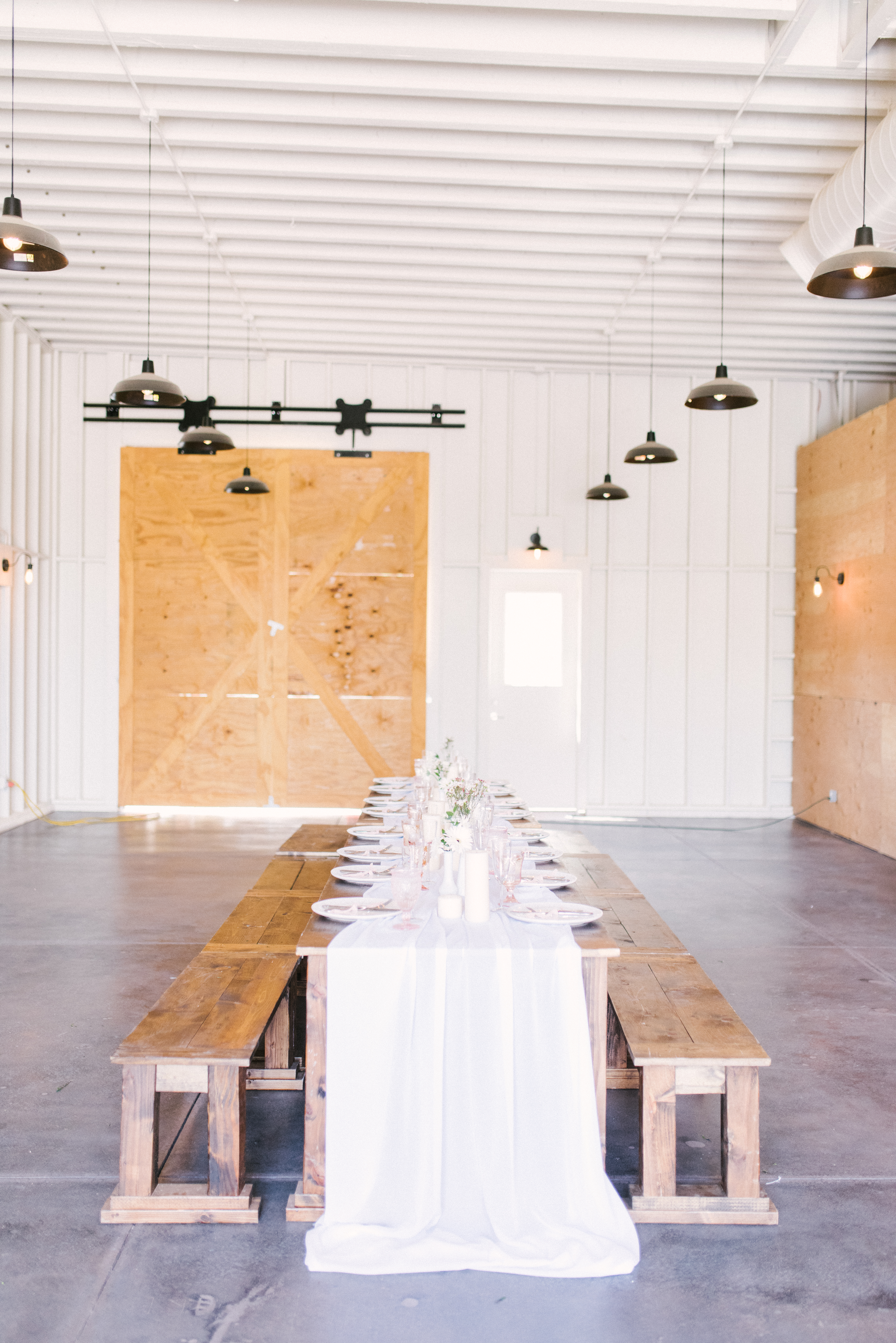 Lovely modern minimalist blush baby shower, set in the coolest industrial farmhouse barn. | glitterinc.com | Hovering Heart Photography | @glitterinc - Modern Minimalist Blush Baby Shower by popular North Carolina style blogger Glitter, Inc.