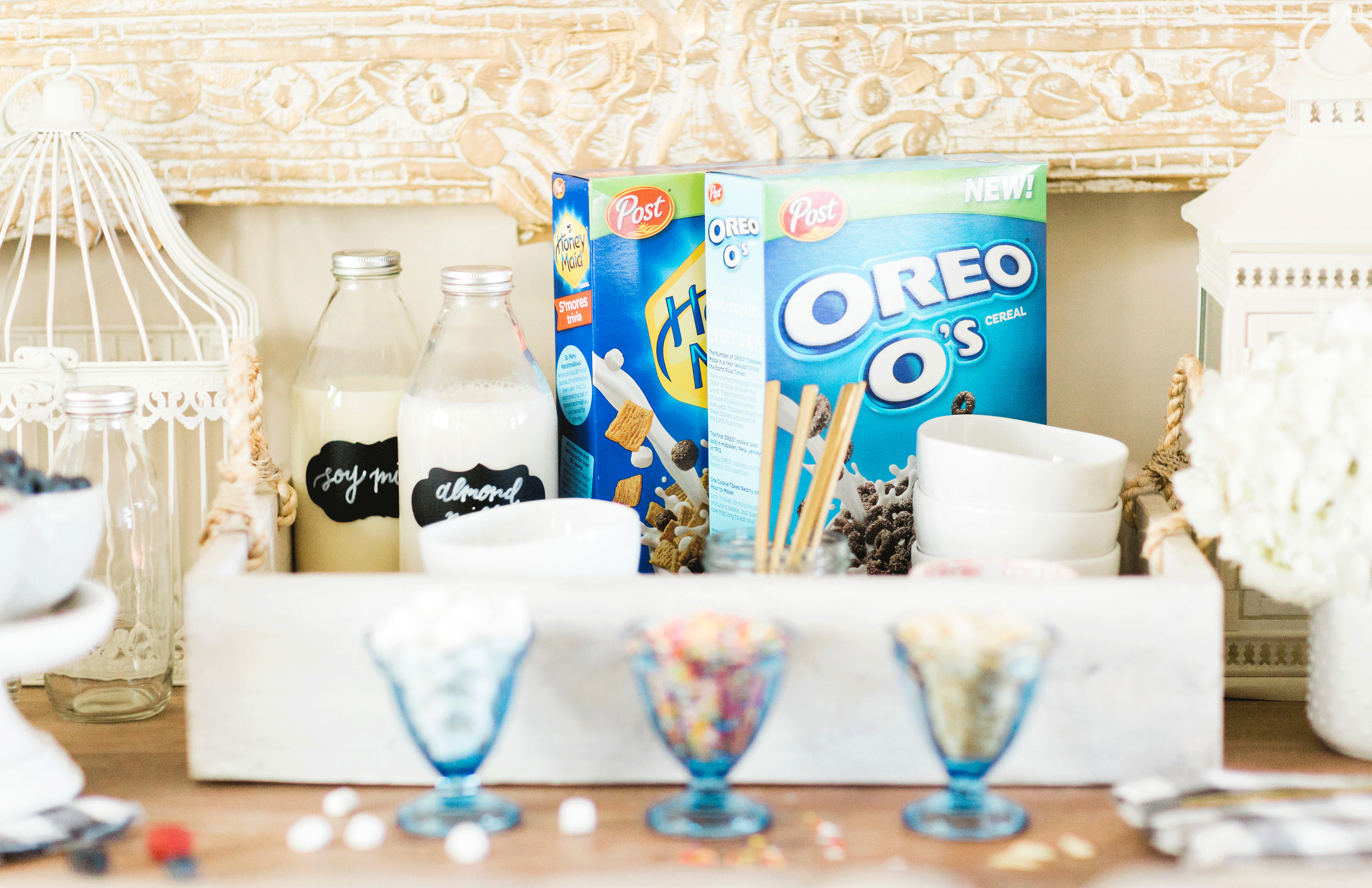Looking for a unique and easy party dessert station? We're showing you how to put together a DIY retro cereal bar; perfect for a festive and memorable brunch, throwback party, pajama-themed soirée, or sleepover for your kids and their friends! Click through for the details. #brunch #brunchideas #cerealbar #cerealstation #party #partyideas #sleepoverparty #pajamaparty | glitterinc.com | @glitterinc