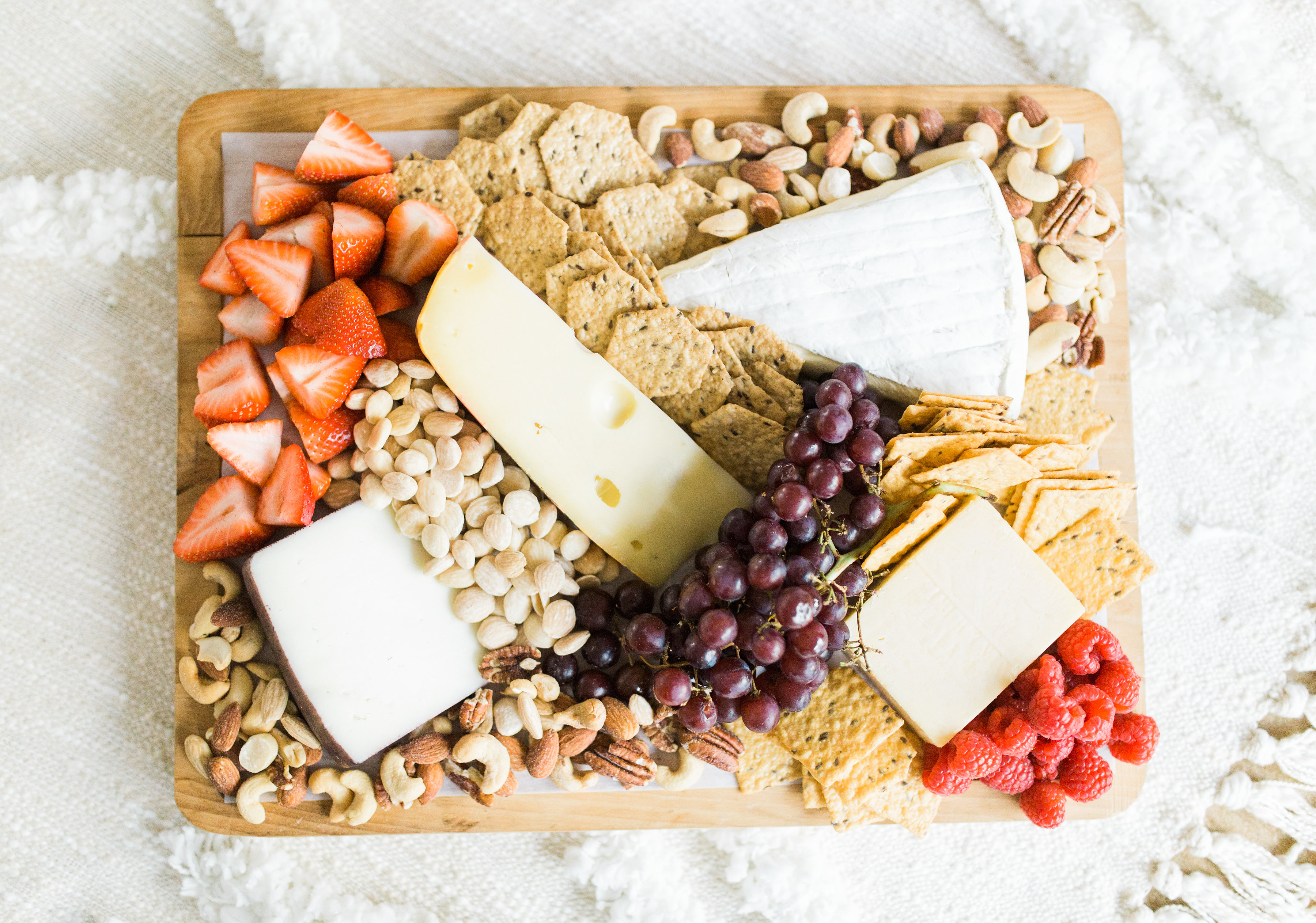 This year, celebrate Galentine's Day (and girl power) with wine and bubbly, cheese, and a whole lot of dessert. Here's how to throw one great party! | glitterinc.com | @glitterinc - Galentine's Day Wine and Cheese Party by North Carolina lifestyle blogger Glitter, Inc.