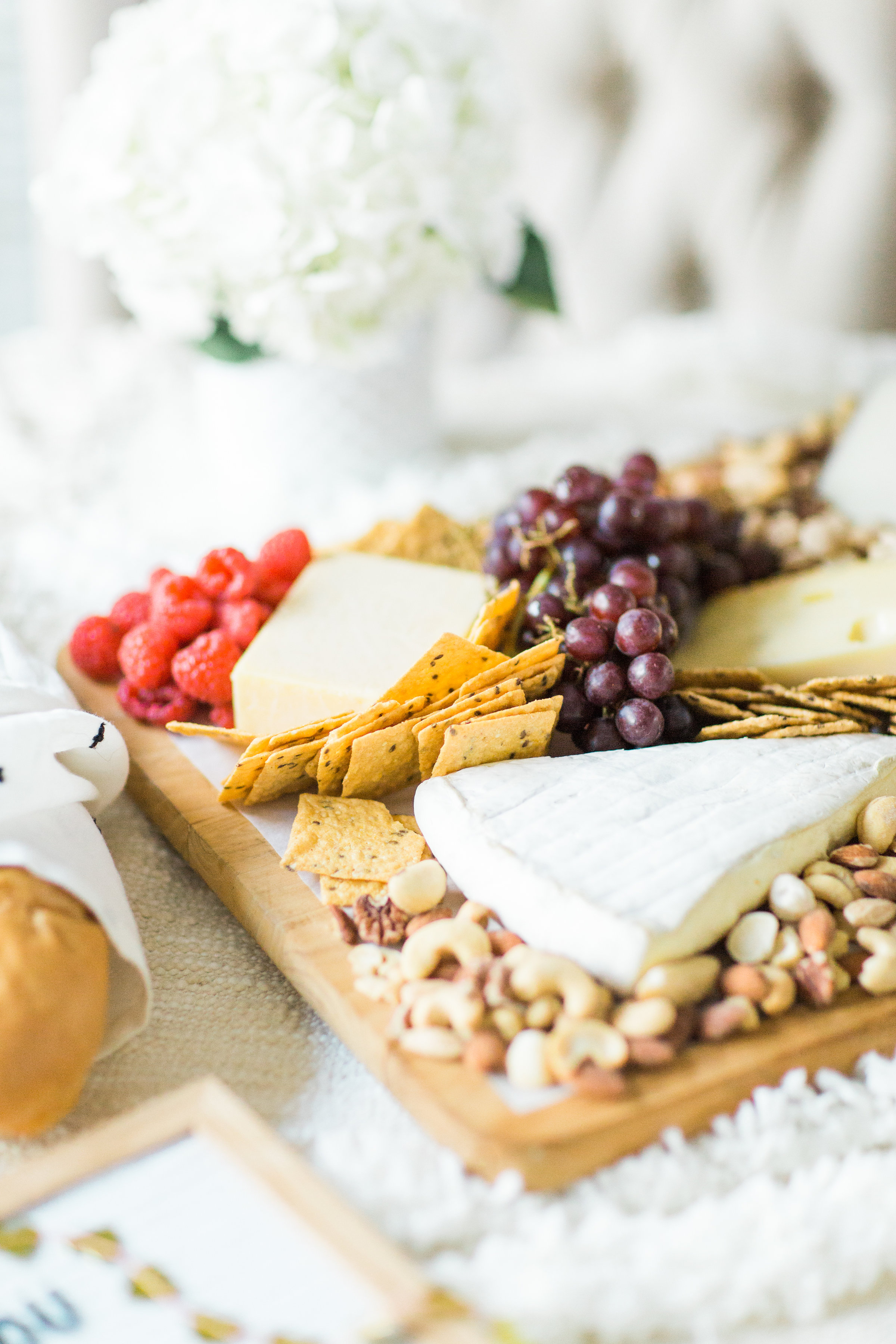This year, celebrate Galentine's Day (and girl power) with wine and bubbly, cheese, and a whole lot of dessert. Here's how to throw one great party! | glitterinc.com | @glitterinc - Galentine's Day Wine and Cheese Party by North Carolina lifestyle blogger Glitter, Inc.