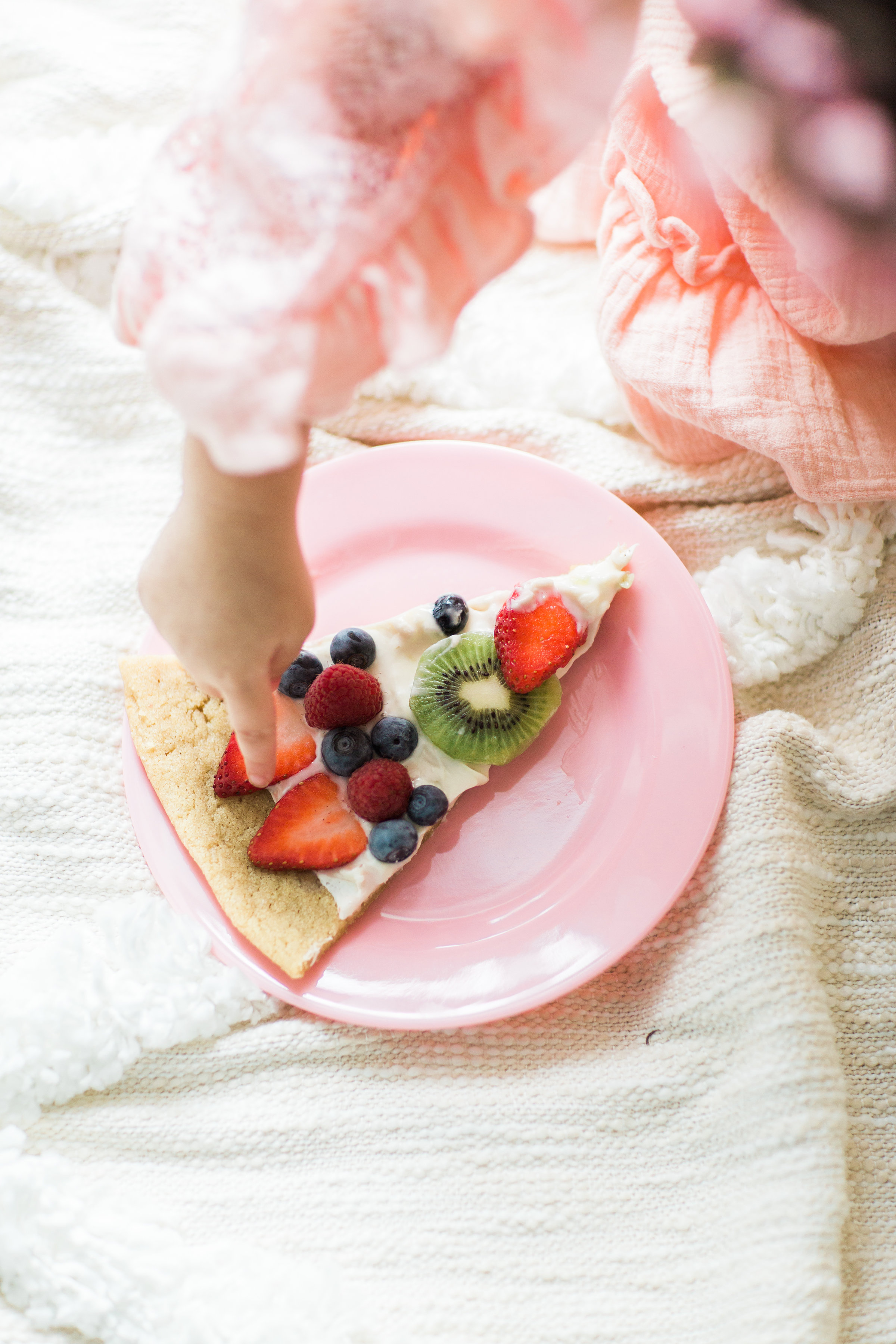 Fruit pizza - a.k.a., dessert pizza - is the kind of dessert everyone will love, and we've made it dairy-free using all simple and loved store-bought items. Click through for the recipe. | glitterinc.com | @glitterinc - Super Simple Dairy-Free Sugar Cookie Fruit Pizza Recipe by popular North Carolina foodie blogger Glitter, Inc.