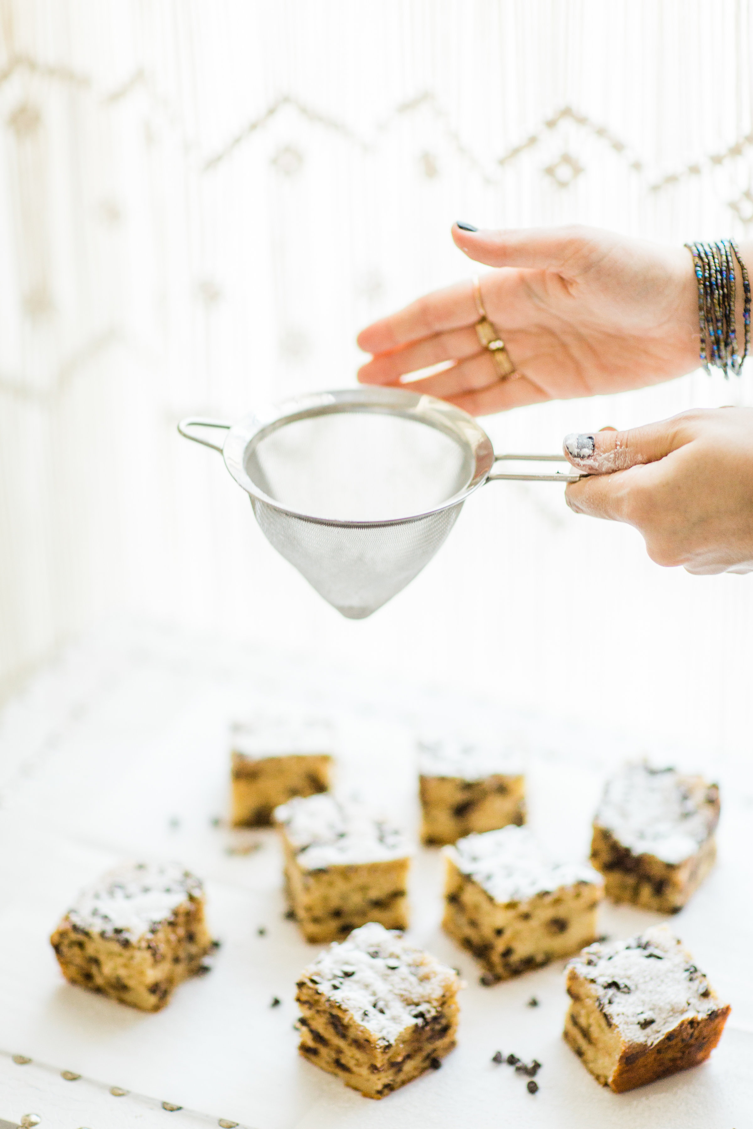 I wish I could properly put into words how amazing this chocolate chip snack cake is. It's nostalgia and buttery, moist decadent melty chocolate-y cake all in one. Click through for the recipe. | glitterinc.com | @glitterinc - Chocolate Chip Snack Cake by North Carolina foodie blogger Glitter, Inc