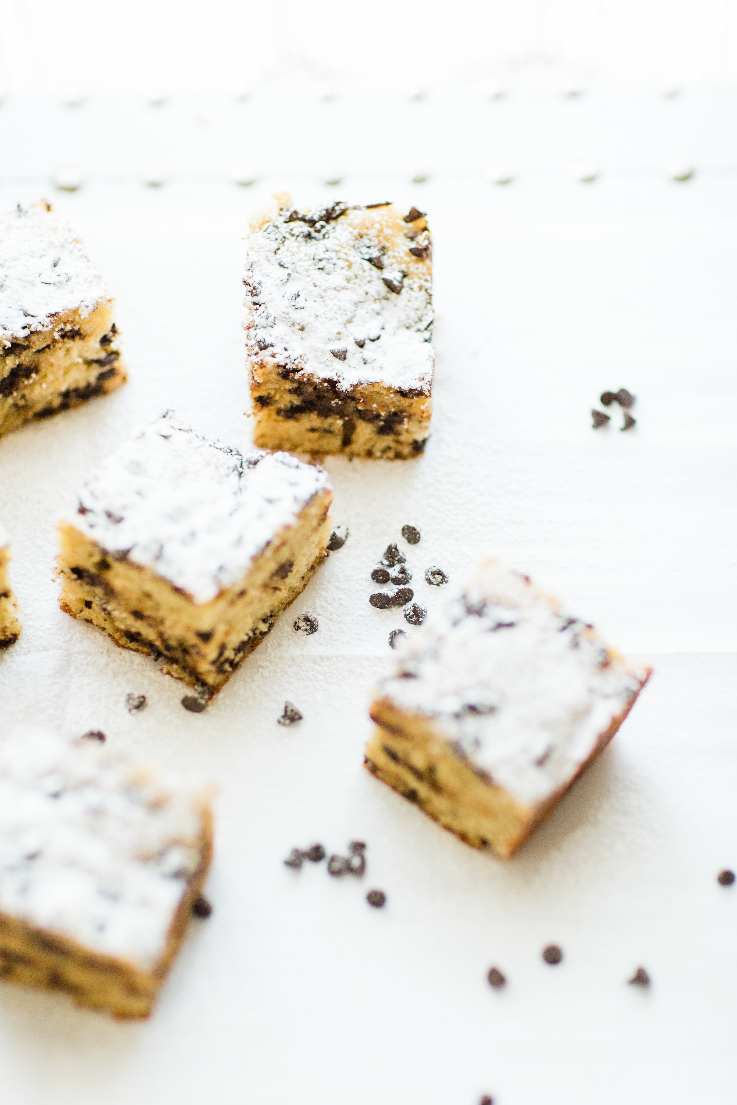 I wish I could properly put into words how amazing this chocolate chip snack cake is. It's nostalgia and buttery, moist decadent melty chocolate-y cake all in one. Click through for the recipe. | glitterinc.com | @glitterinc - Chocolate Chip Snack Cake by North Carolina foodie blogger Glitter, Inc