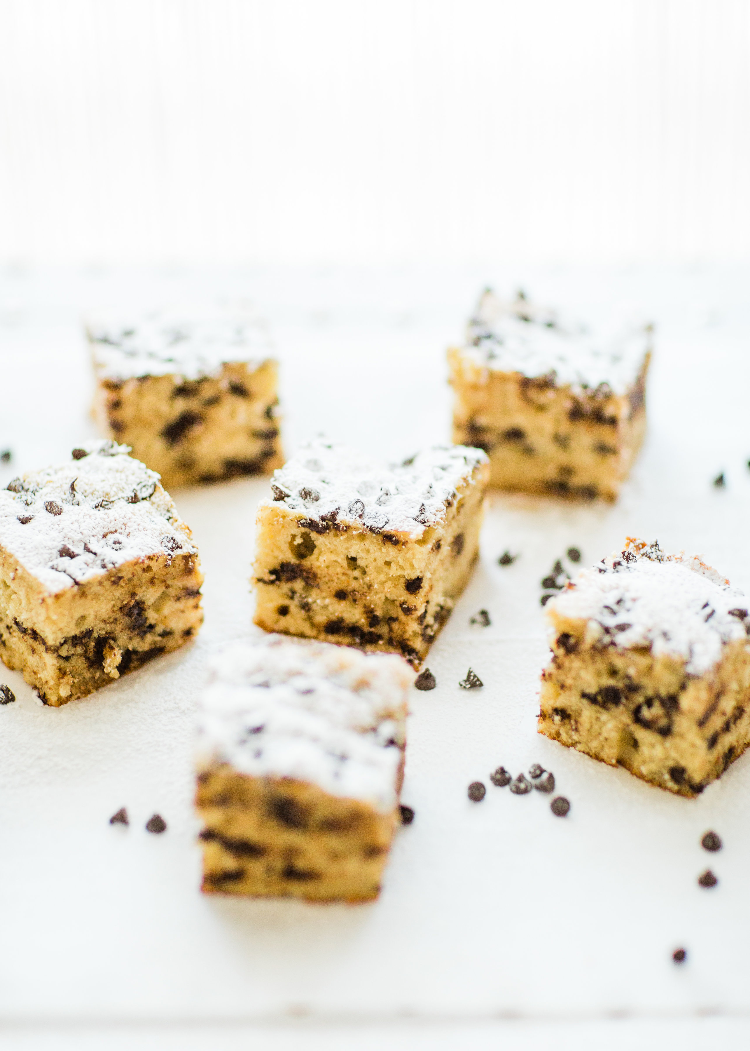 I wish I could properly put into words how amazing this chocolate chip snack cake is. It's nostalgia and buttery, moist decadent melty chocolate-y cake all in one. Click through for the recipe. | glitterinc.com | @glitterinc - Chocolate Chip Snack Cake by North Carolina foodie blogger Glitter, Inc