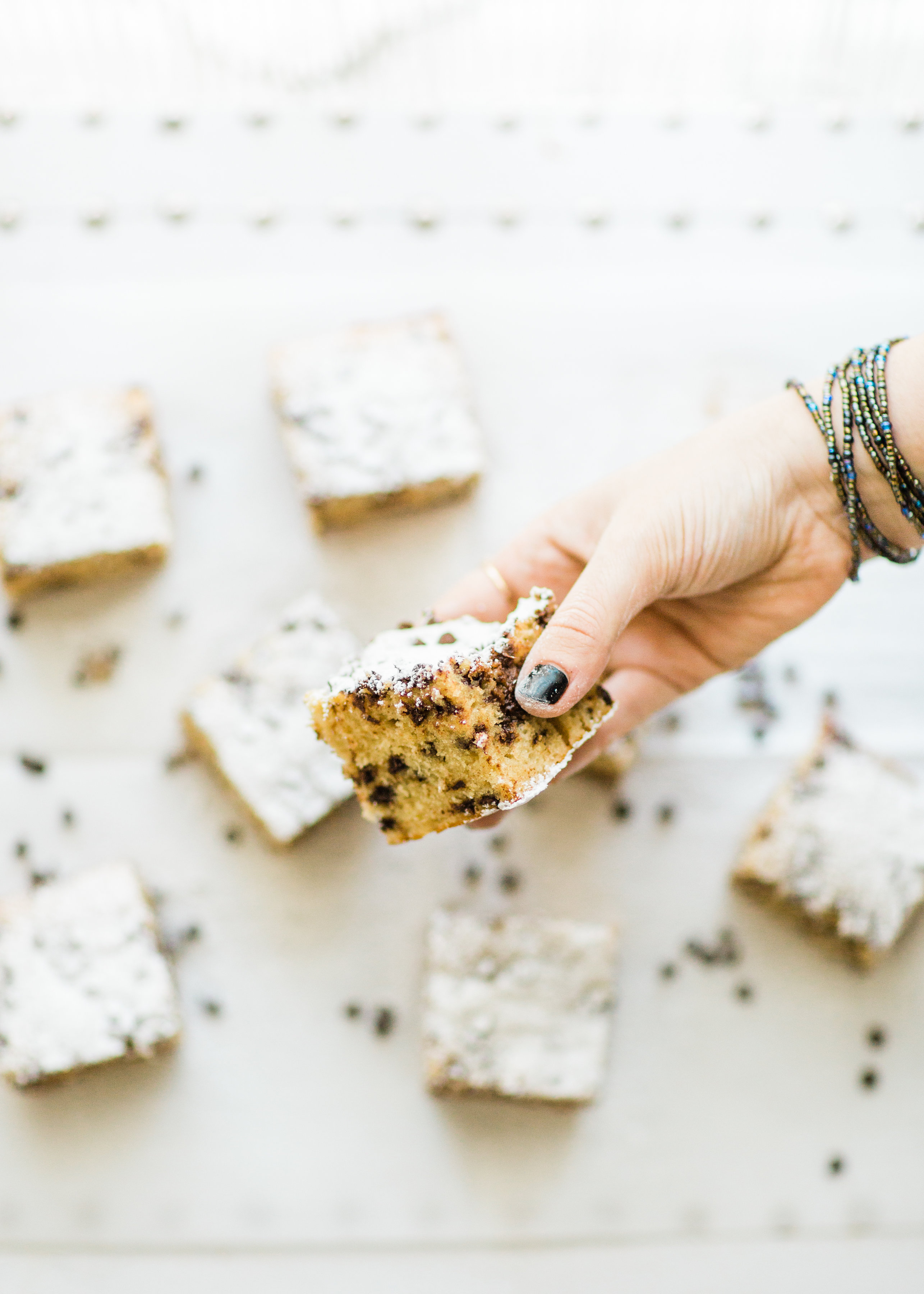 I wish I could properly put into words how amazing this chocolate chip snack cake is. It's nostalgia and buttery, moist decadent melty chocolate-y cake all in one. Click through for the recipe. | glitterinc.com | @glitterinc - Chocolate Chip Snack Cake by North Carolina foodie blogger Glitter, Inc