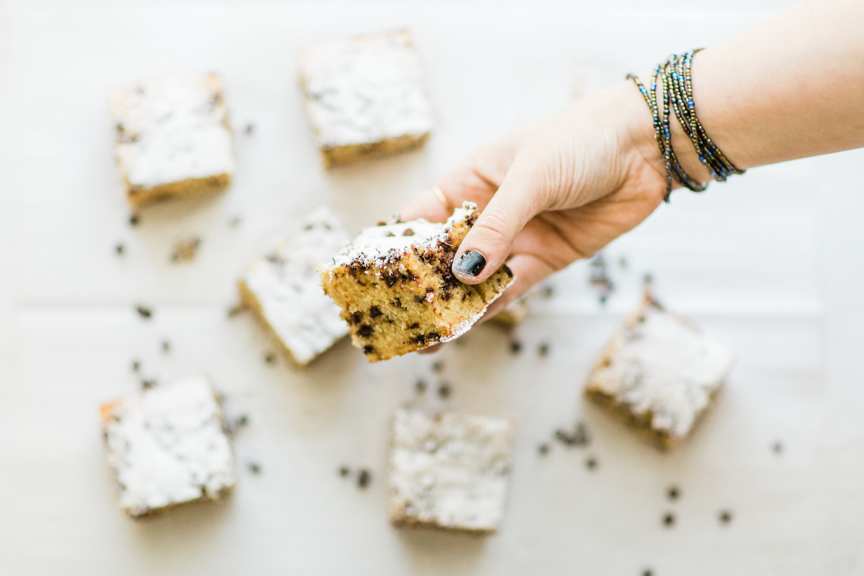 I wish I could properly put into words how amazing this chocolate chip snack cake is. It's nostalgia and buttery, moist decadent melty chocolate-y cake all in one. Click through for the recipe. | glitterinc.com | @glitterinc - Chocolate Chip Snack Cake by North Carolina foodie blogger Glitter, Inc