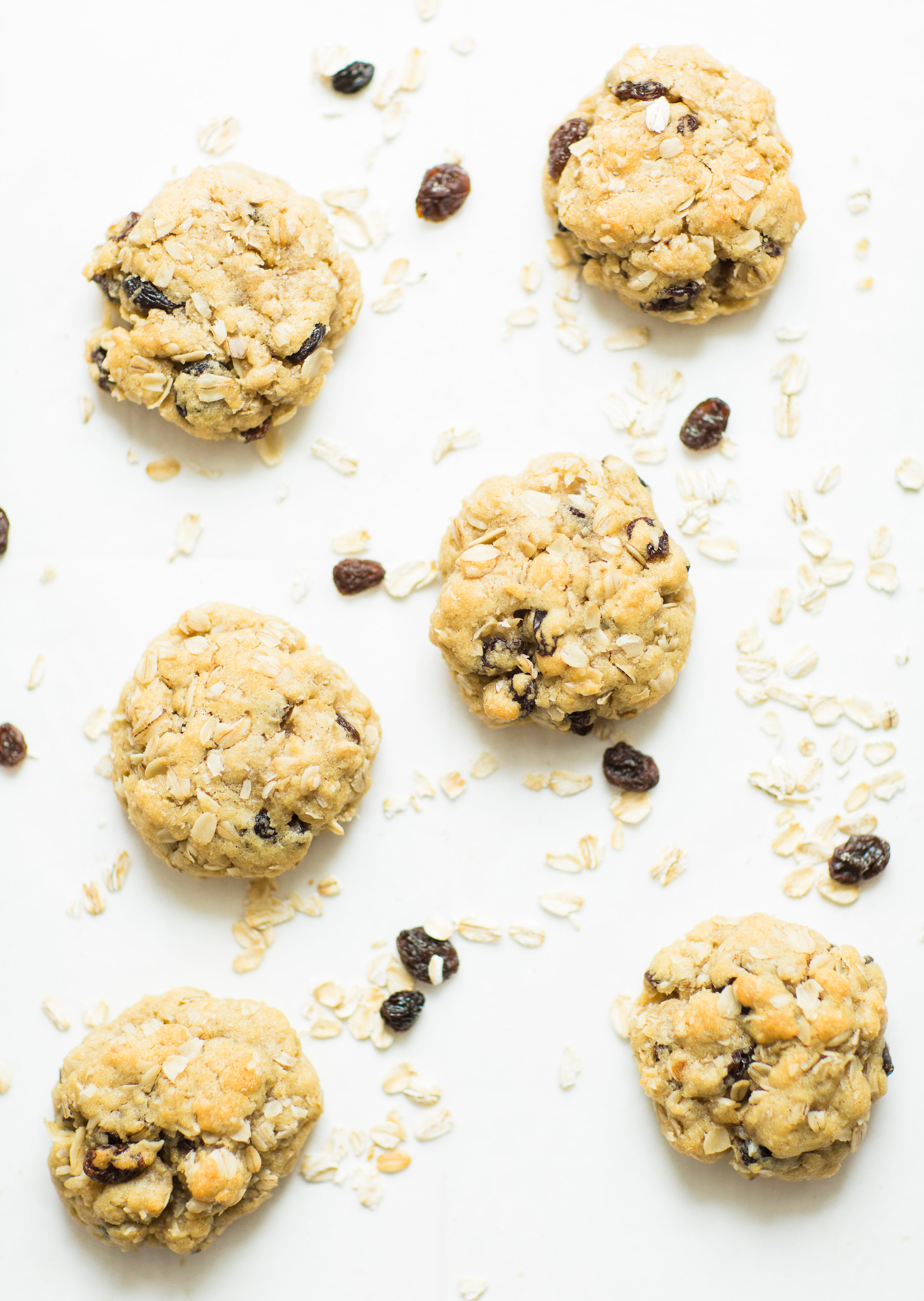 I've found the perfect oatmeal cookies for our family. Crispy on the outside and super soft on the inside, they taste just slightly under-baked; and, bonus - they're dairy-free and can be made gluten-free.Click through for the recipe. | glitterinc.com | @glitterinc - Favorite Oatmeal Raisin Cookies Recipe by popular North Carolina foodie blogger Glitter, Inc.