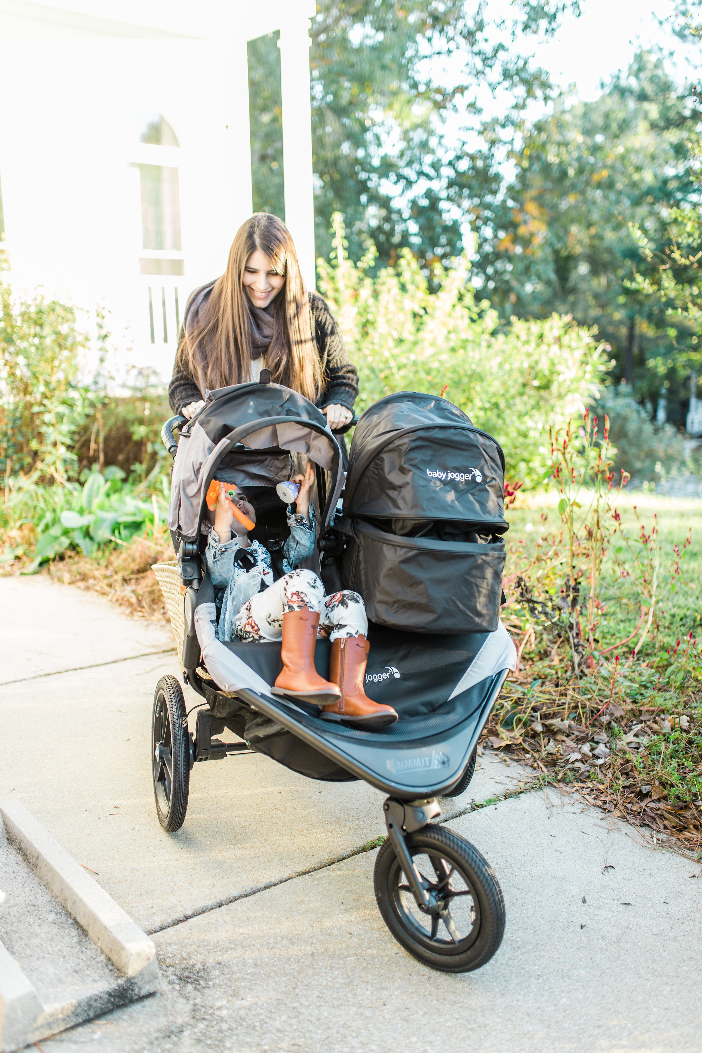 Mom Blogger Lexi of Glitter, Inc. shares and reviews the new baby gear her growing family added to their collection for two kids, including the Baby Jogger Summit X3 Double Jogging Stroller and Graco 4Ever Extend2Fit 4-in-1 Car Seats. | glitterinc.com | @glitterinc