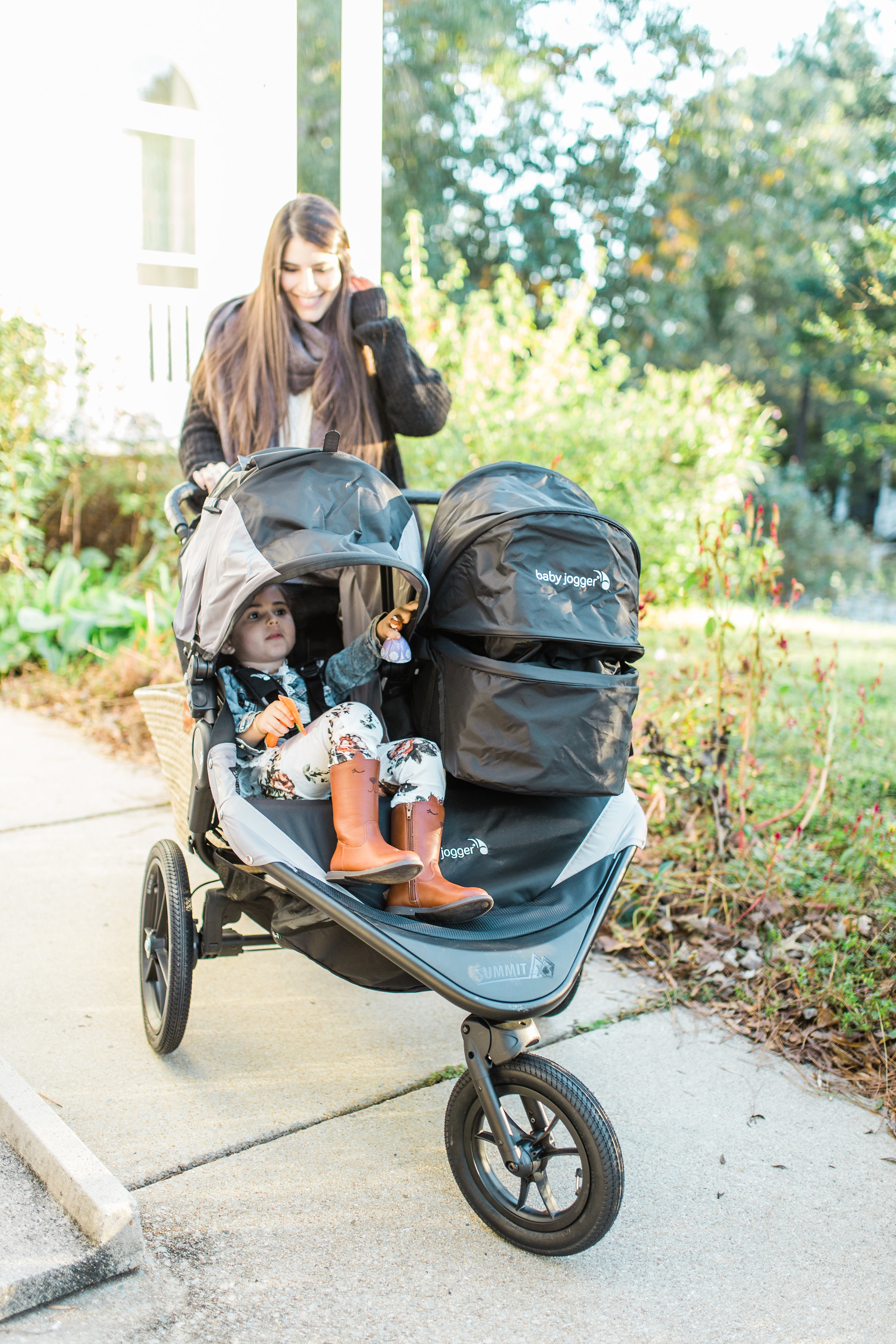 Mom Blogger Lexi of Glitter, Inc. shares and reviews the new baby gear her growing family added to their collection for two kids, including the Baby Jogger Summit X3 Double Jogging Stroller and Graco 4Ever Extend2Fit 4-in-1 Car Seats. | glitterinc.com | @glitterinc