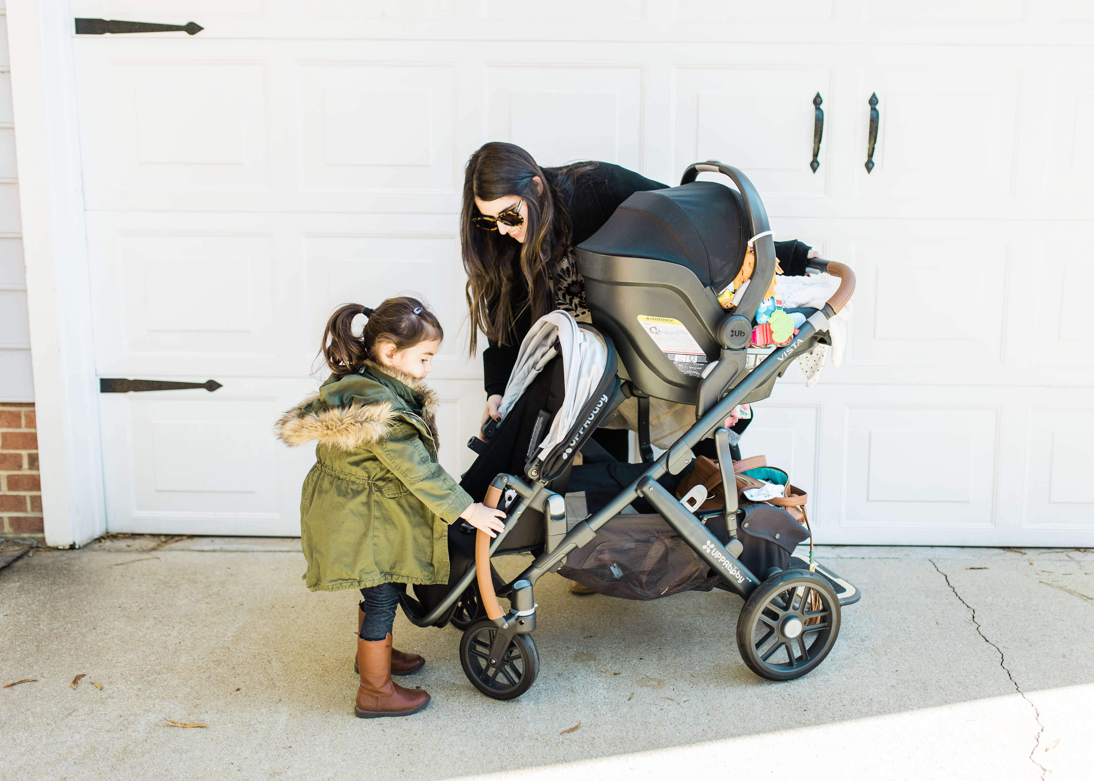 It's finally here! Our review of the UPPAbaby VISTA (and how we use the stroller for two kids under three); plus details about using the RumbleSeat, MESA Car Seat, and PiggyBack Ride-Along Board. Click through for the details. | glitterinc.com | @glitterinc