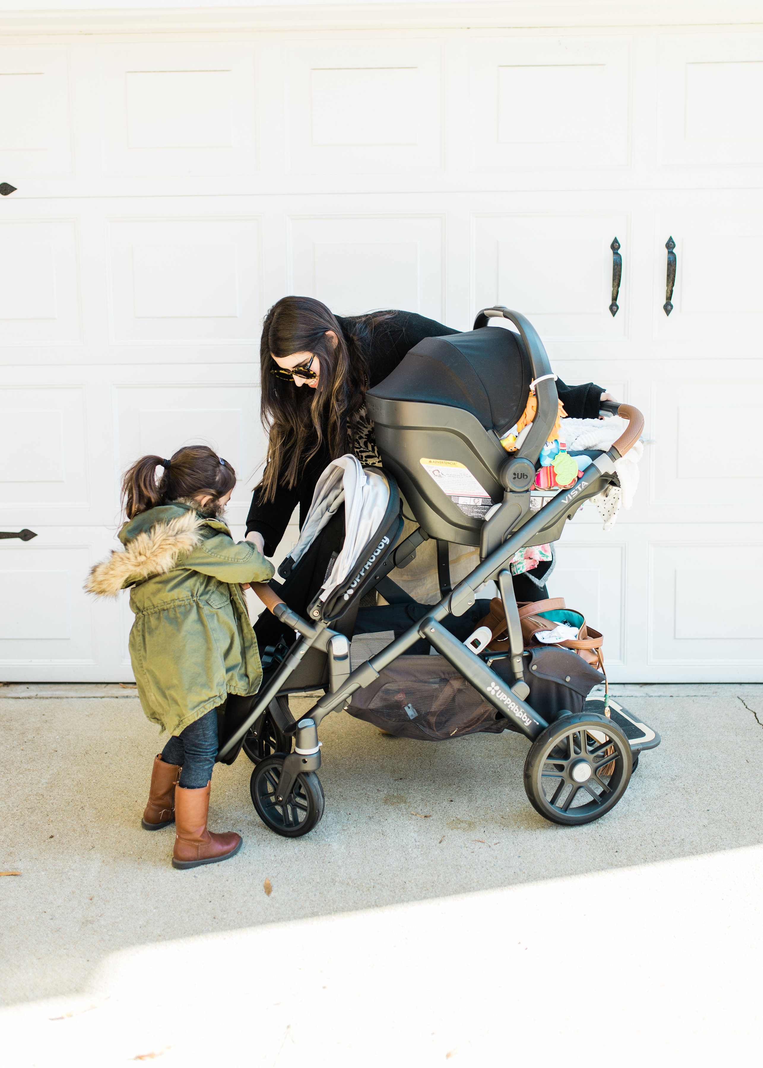 It's finally here! Our review of the UPPAbaby VISTA (and how we use the stroller for two kids under three); plus details about using the RumbleSeat, MESA Car Seat, and PiggyBack Ride-Along Board. Click through for the details. | glitterinc.com | @glitterinc - The Dream Stroller That Grows With Your Family: UPPAbaby VISTA by popular North Carolina mom blogger Glitter, Inc.