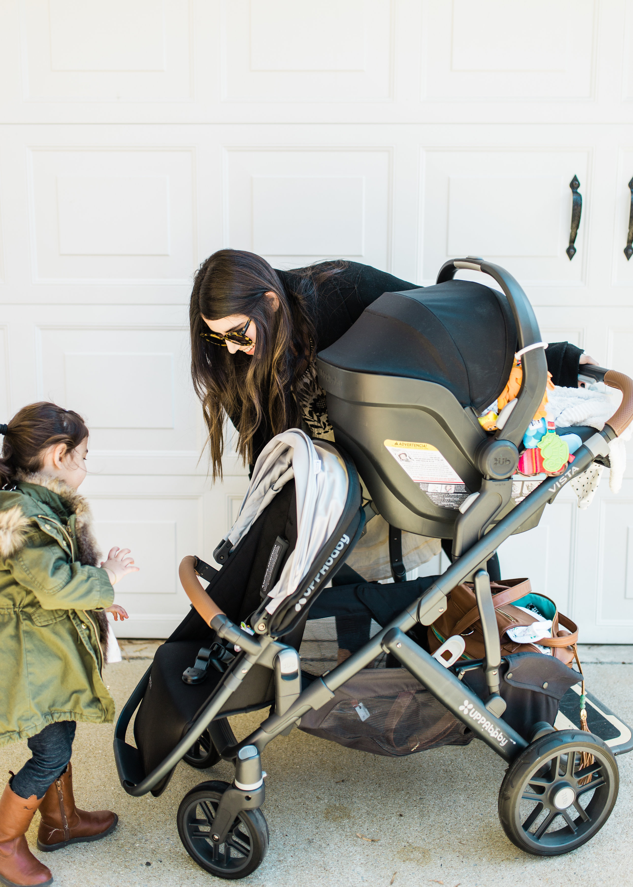 It's finally here! Our review of the UPPAbaby VISTA (and how we use the stroller for two kids under three); plus details about using the RumbleSeat, MESA Car Seat, and PiggyBack Ride-Along Board. Click through for the details. | glitterinc.com | @glitterinc - The Dream Stroller That Grows With Your Family: UPPAbaby VISTA by popular North Carolina mom blogger Glitter, Inc.