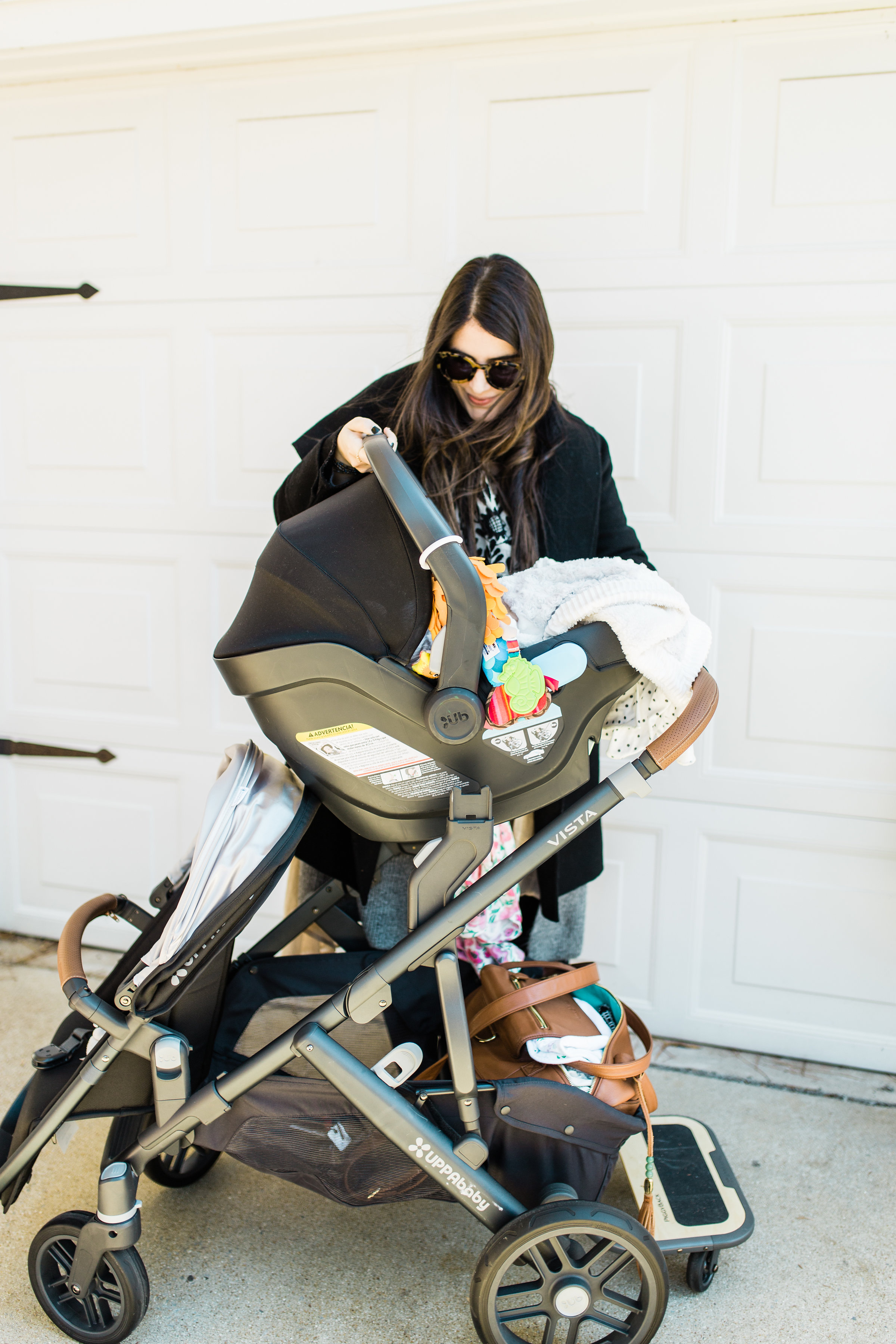 It's finally here! Our review of the UPPAbaby VISTA (and how we use the stroller for two kids under three); plus details about using the RumbleSeat, MESA Car Seat, and PiggyBack Ride-Along Board. Click through for the details. | glitterinc.com | @glitterinc - The Dream Stroller That Grows With Your Family: UPPAbaby VISTA by popular North Carolina mom blogger Glitter, Inc.