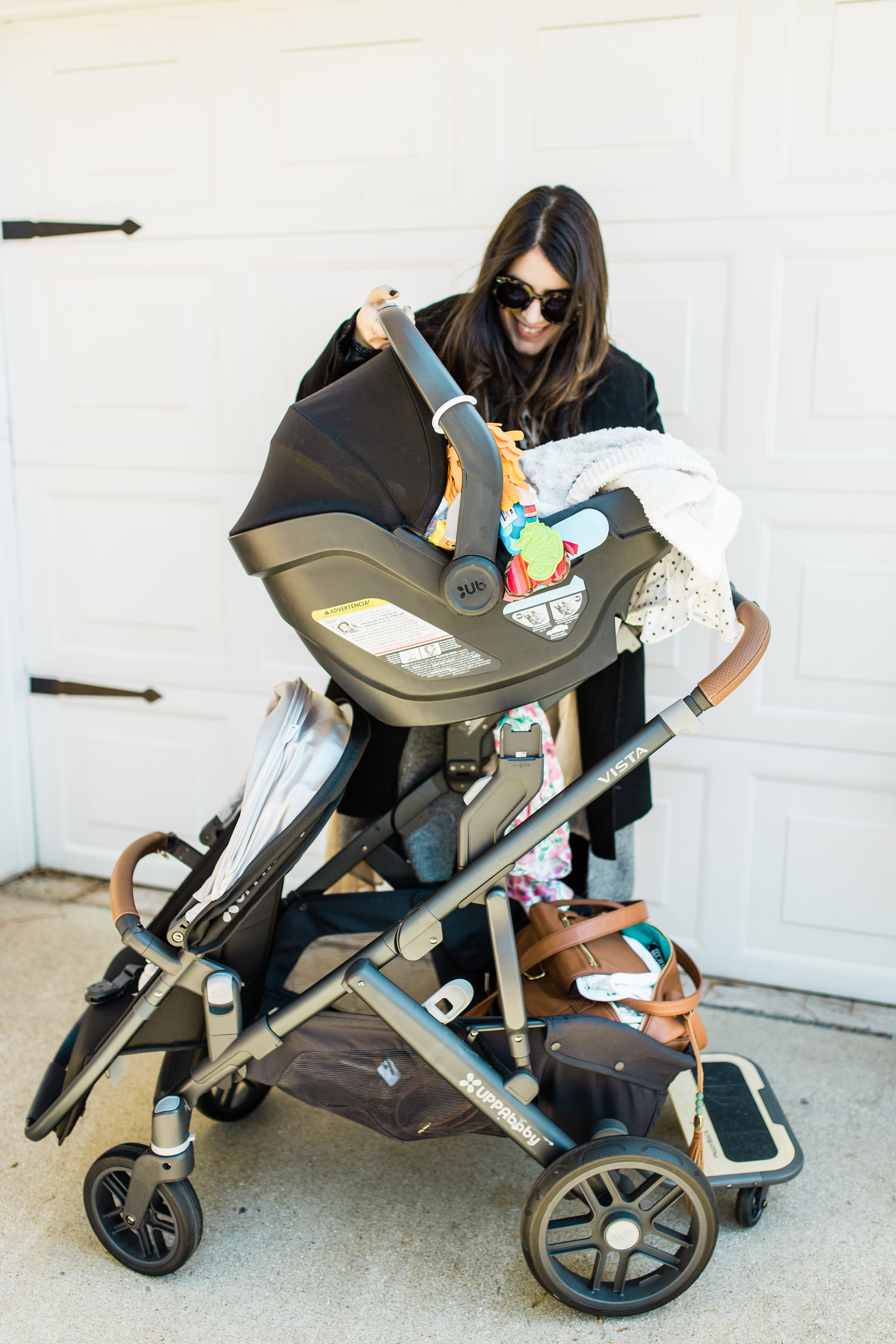 It's finally here! Our review of the UPPAbaby VISTA (and how we use the stroller for two kids under three); plus details about using the RumbleSeat, MESA Car Seat, and PiggyBack Ride-Along Board. Click through for the details. | glitterinc.com | @glitterinc - The Dream Stroller That Grows With Your Family: UPPAbaby VISTA by popular North Carolina mom blogger Glitter, Inc.