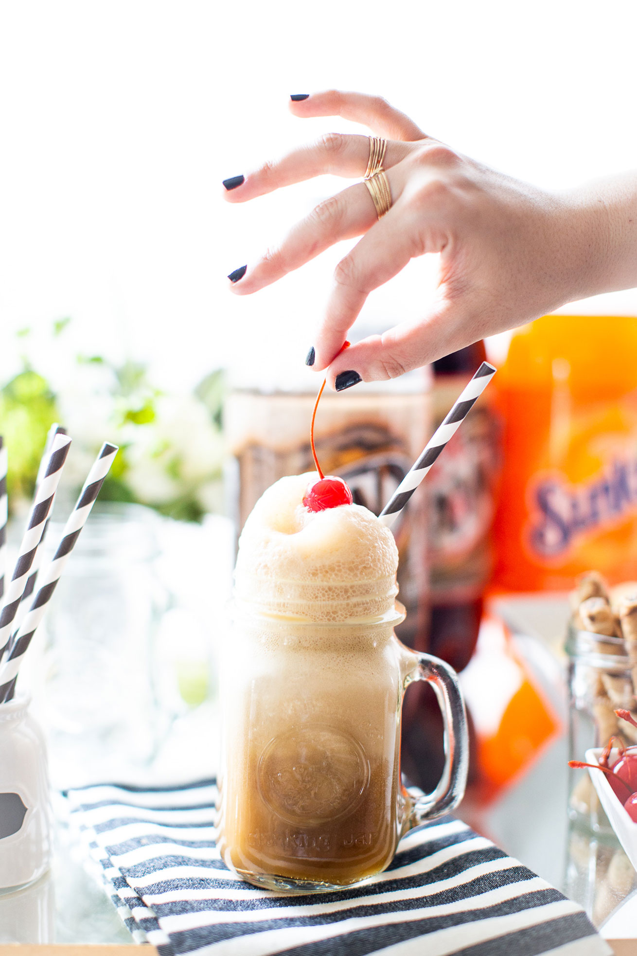 Ready to celebrate family night in a whole new way? Make your own root beer float bar with all of the best toppings, for a legendary sweet treat! | glitterinc.com | @glitterinc