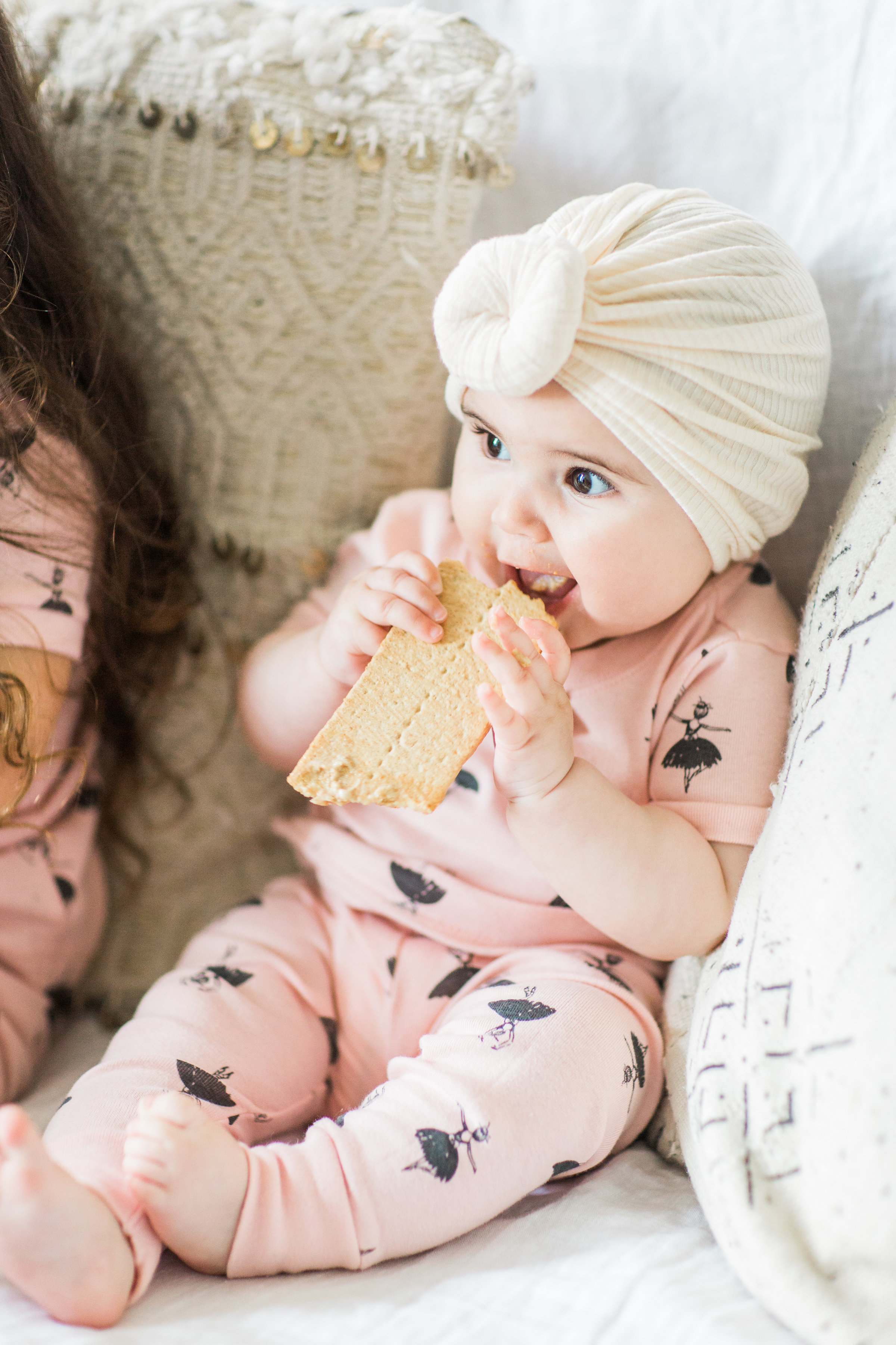 I'm sharing a big 'ol dose of cuteness; a.k.a., the behind-the-scenes of the girls trying s'mores for the first time (and caught on camera) from our family movie night! #smores #matchingpajamas #movienight #familyfun #smoresparty | glitterinc.com | @glitterinc