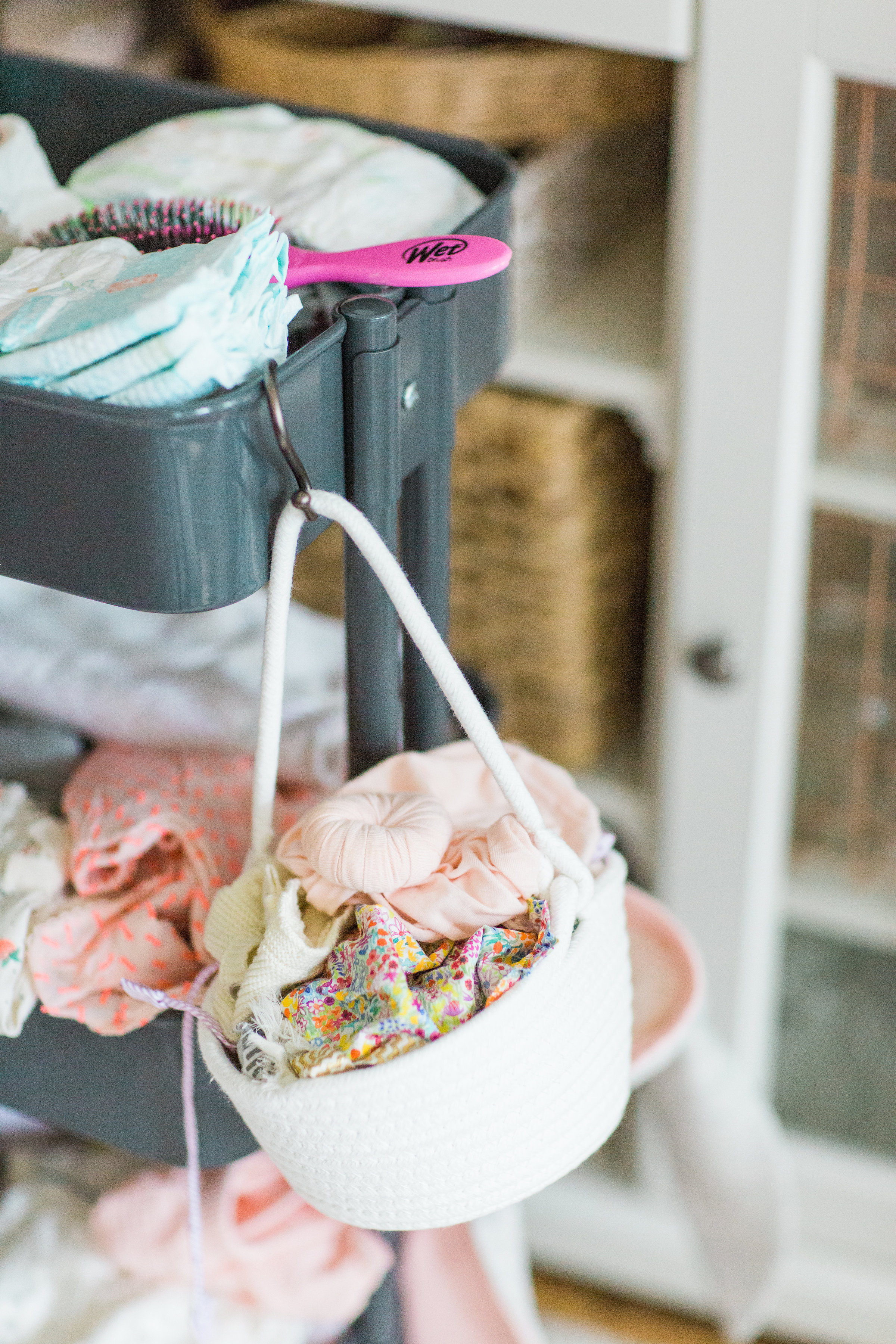 Making life easier with a new baby is the name of the game. Mom blogger Lexi of Glitter, Inc. shares a DIY new baby changing station using everyone's favorite Ikea RÅSKOG Cart. #diy #ikeahack #ikeacart #ikearaskogcart #babychangingstation #babychangingcart #changingstation #changingcart #diaperorganization #baby #newbaby | Click through for the details. | glitterinc.com | @glitterinca