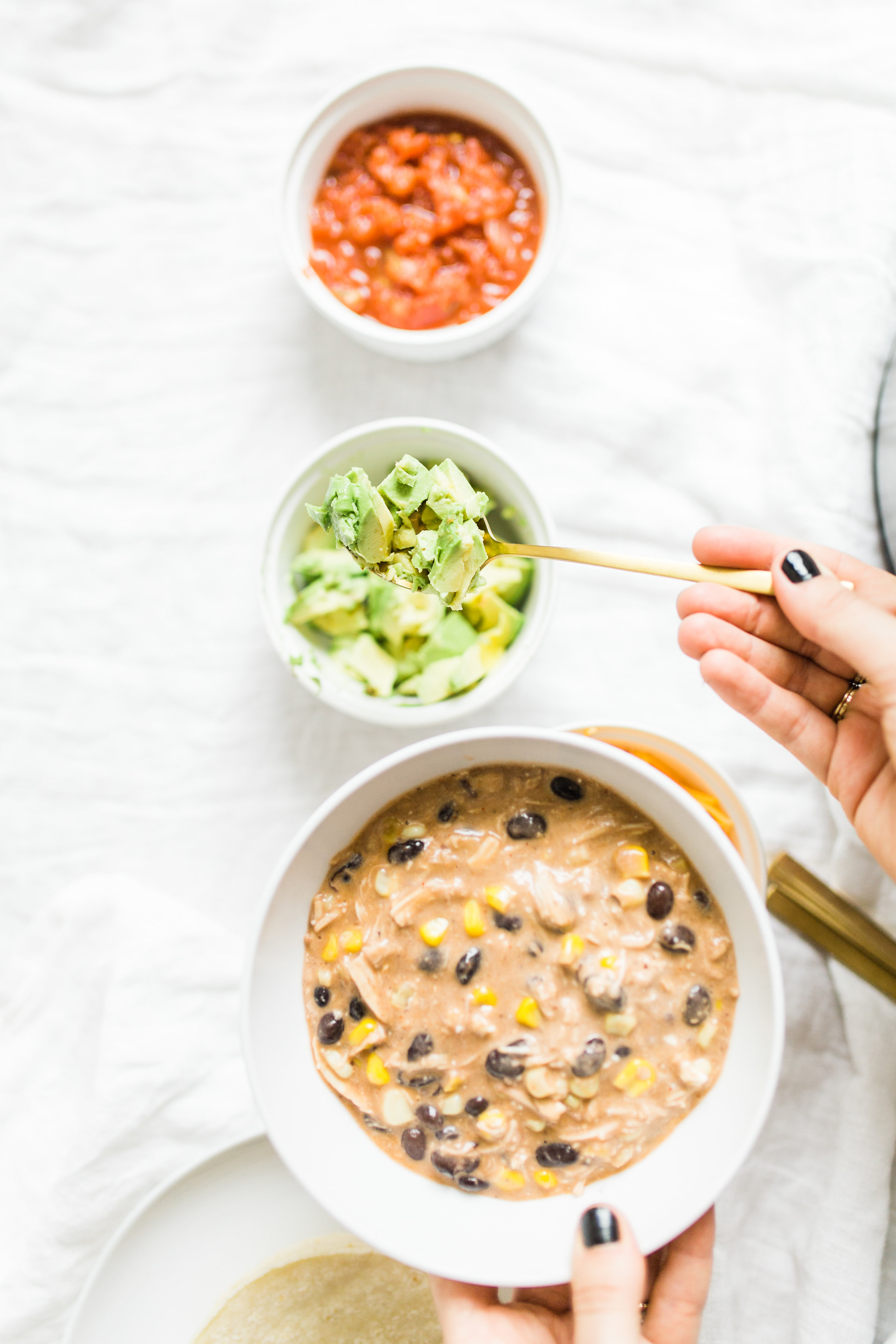 This easy and delicious creamy chicken enchilada soup is made in a crockpot or Instant Pot - a.k.a., dump it and forget it. Our whole family loves it. #crockpot #crockpotmeals #crockpotdinner #instantpot #instantpotdinner #instantpotchicken #crockpotchicken #chickenenchiladas #crockpotenchiladas #instantpotenchiladas #slowcooker #slowcookersoup #slowcookerenchiladas #slowcookermeals Click through for the recipe. | glitterinc.com | @glitterinc