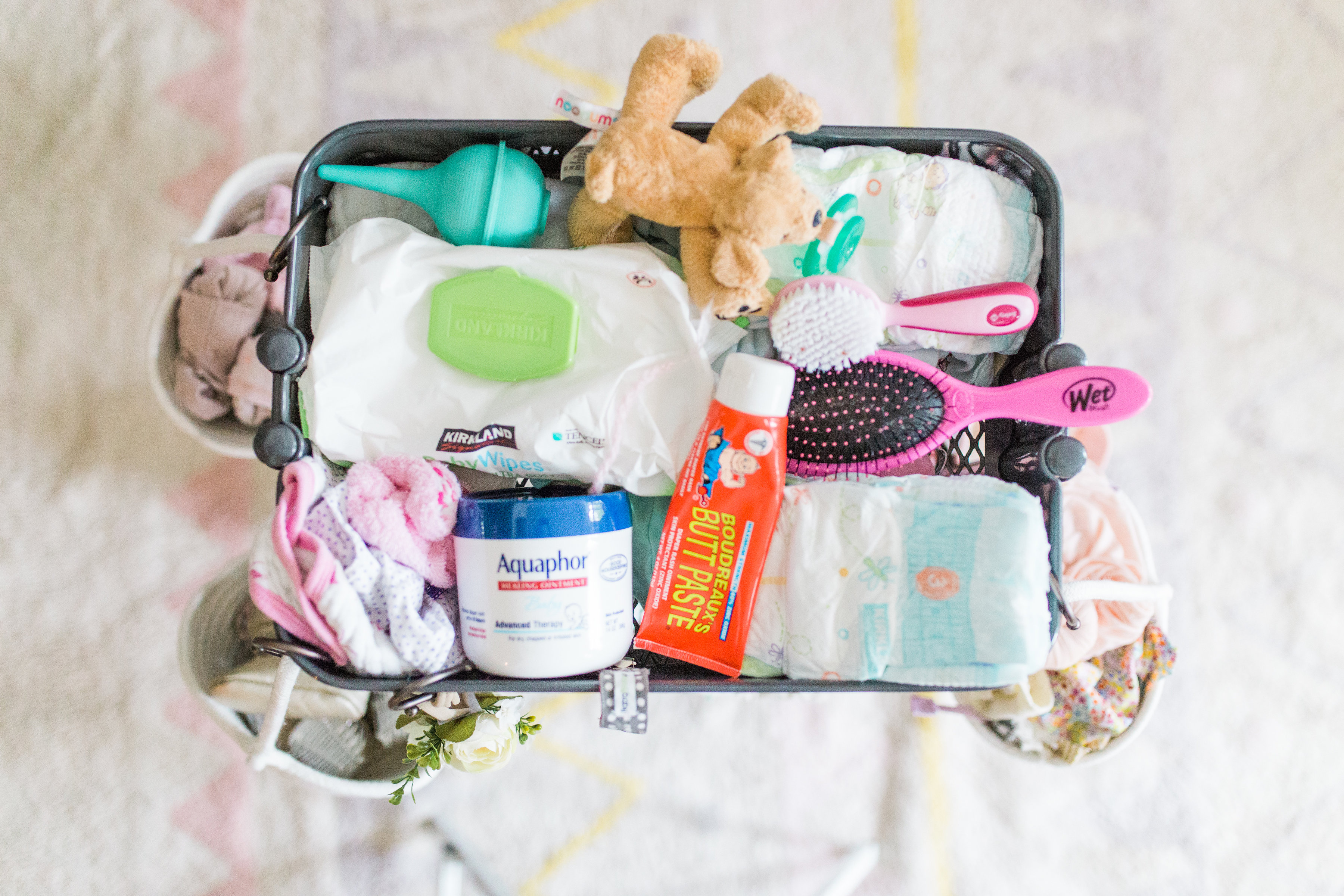 Making life easier with a new baby is the name of the game. Mom blogger Lexi of Glitter, Inc. shares a DIY new baby changing station using everyone's favorite Ikea RÅSKOG Cart. #diy #ikeahack #ikeacart #ikearaskogcart #babychangingstation #babychangingcart #changingstation #changingcart #diaperorganization #baby #newbaby | Click through for the details. | glitterinc.com | @glitterinc