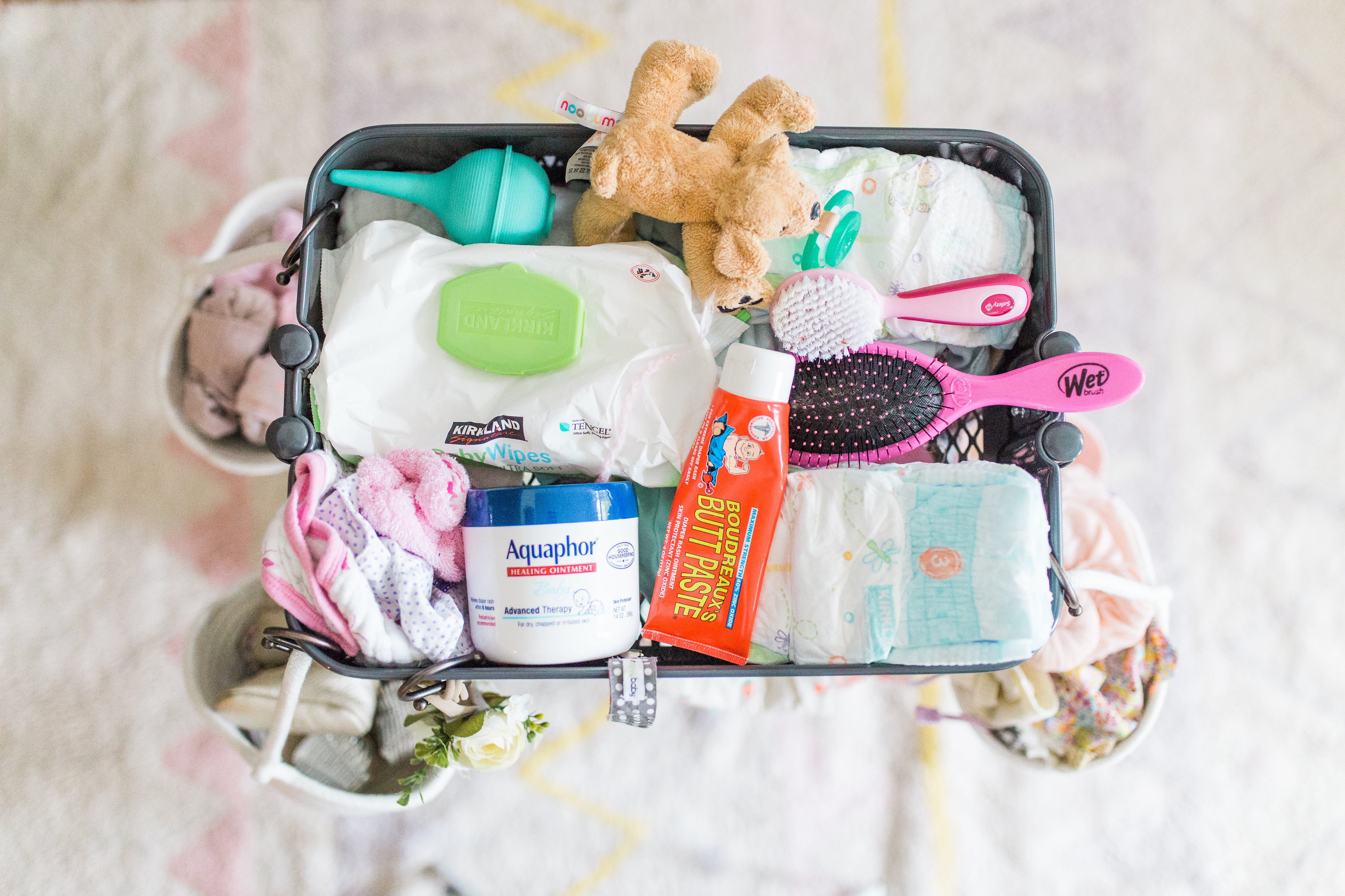 Making life easier with a new baby is the name of the game. Mom blogger Lexi of Glitter, Inc. shares a DIY new baby changing station using everyone's favorite Ikea RÅSKOG Cart. #diy #ikeahack #ikeacart #ikearaskogcart #babychangingstation #babychangingcart #changingstation #changingcart #diaperorganization #baby #newbaby | Click through for the details. | glitterinc.com | @glitterinc