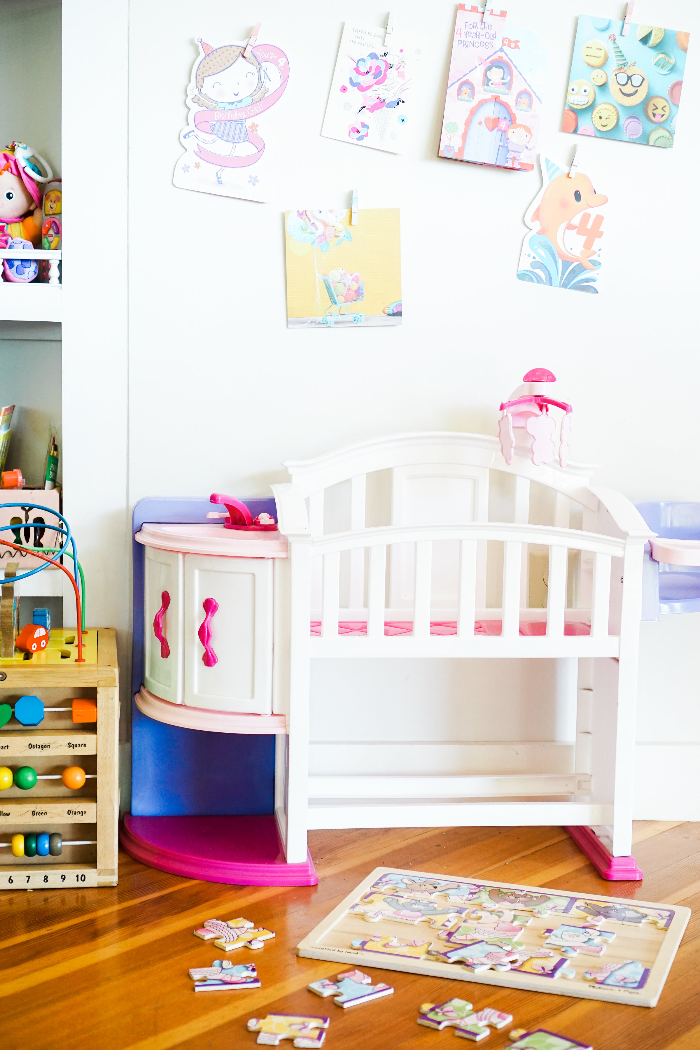 Celebrate your little ones' birthdays in memorable ways with this adorable birthday tradition: a sweet way to display cards in your kids' playspace. #birthday #greetingcards #playspace Click through for the details. | glitterinc.com | @glitterinc