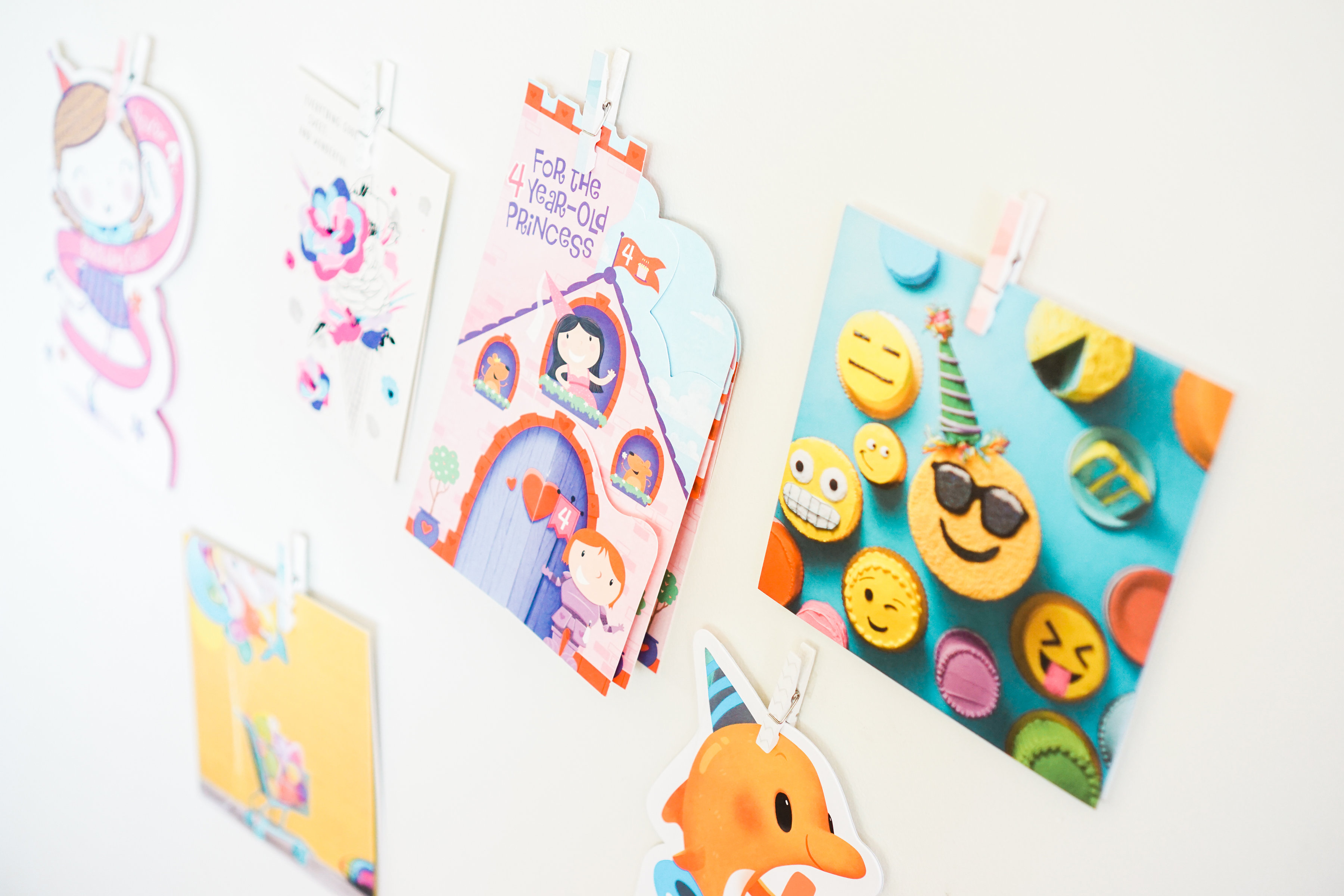 Celebrate your little ones' birthdays in memorable ways with this adorable birthday tradition: a sweet way to display cards in your kids' playspace. #birthday #greetingcards #playspace Click through for the details. | glitterinc.com | @glitterinc