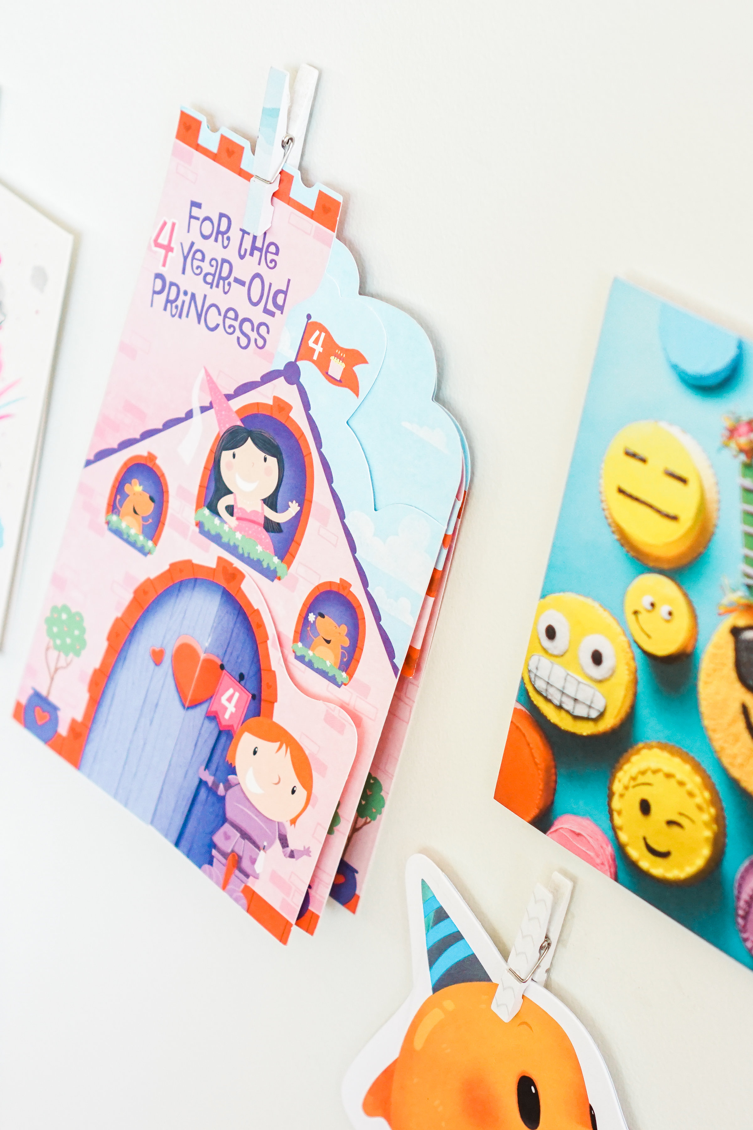 Celebrate your little ones' birthdays in memorable ways with this adorable birthday tradition: a sweet way to display cards in your kids' playspace. #birthday #greetingcards #playspace Click through for the details. | glitterinc.com | @glitterinc