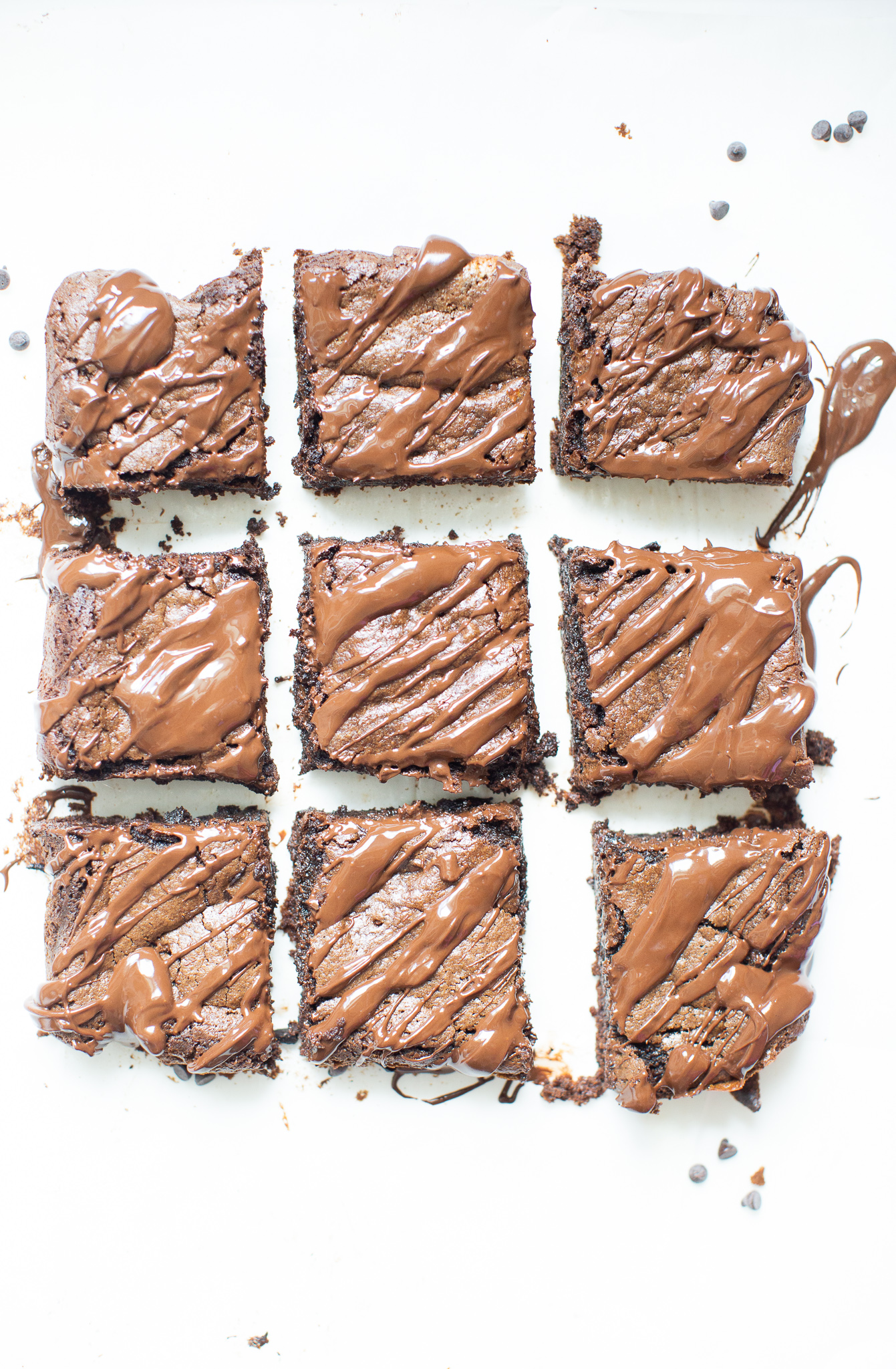 If you've been searching for a guilt-free dessert to satisfy your sweet tooth, then look no further than these magical fudgy tahini brownies. They are easily one of my favorite brownie recipes EVER! #brownies #healthydessert #tahinibrownies #glutenfree #dairyfree #paleo #grainfree | glitterinc.com | @glitterinc