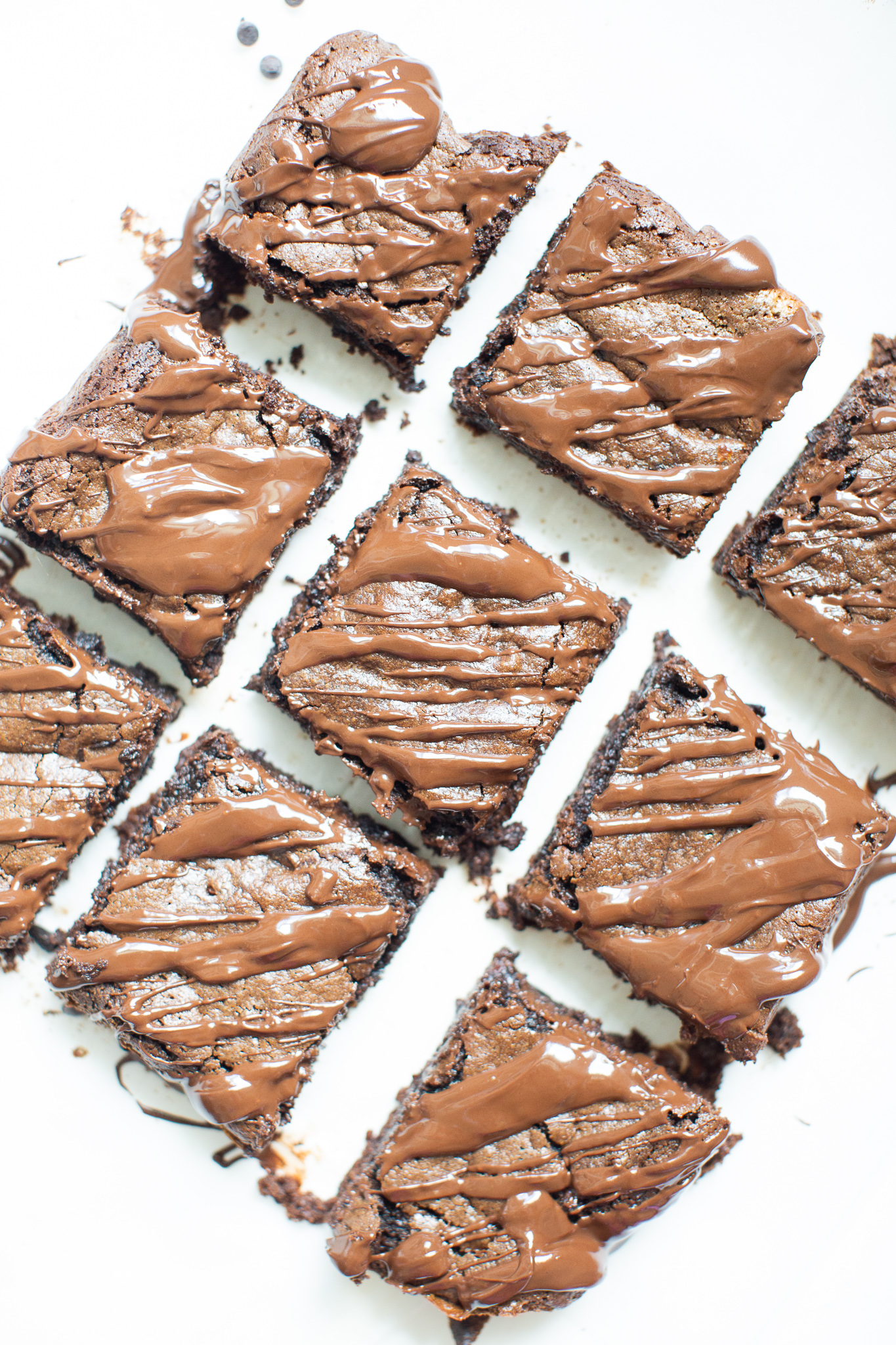 If you've been searching for a guilt-free dessert to satisfy your sweet tooth, then look no further than these magical fudgy tahini brownies. They are easily one of my favorite brownie recipes EVER! #brownies #healthydessert #tahinibrownies #glutenfree #dairyfree #paleo #grainfree | glitterinc.com | @glitterinc