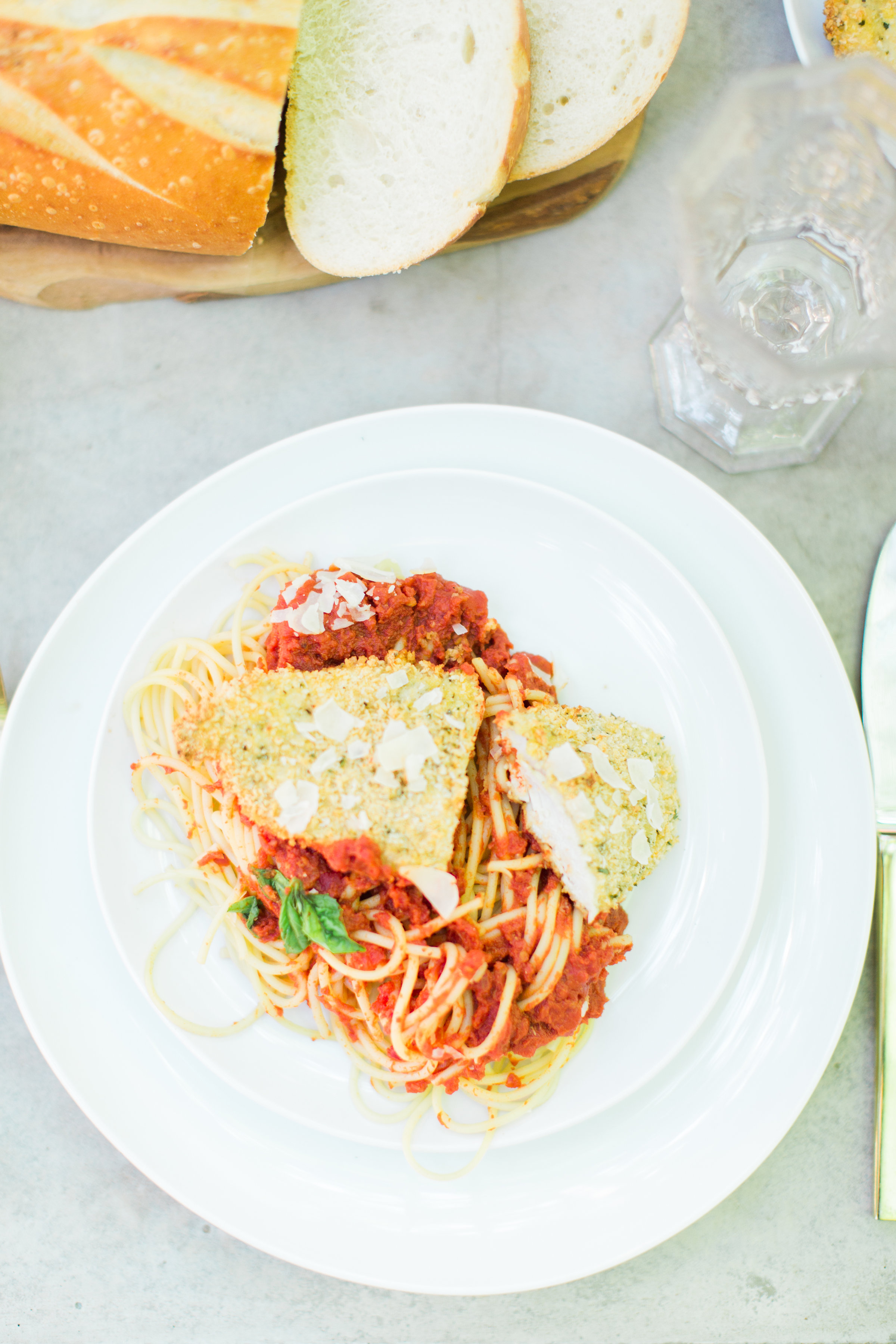 Throw an easy, light-hearted, and fun get-together for friends and family with one of our favorites - the spaghetti dinner party. Sharing how we throw a memorable spaghetti dinner - that everyone will love - in just a few simple steps! #dinnerparty #spaghettidinner #pastadinner #italiandinnerparty Click through for the details. | glitterinc.com | @glitterinc