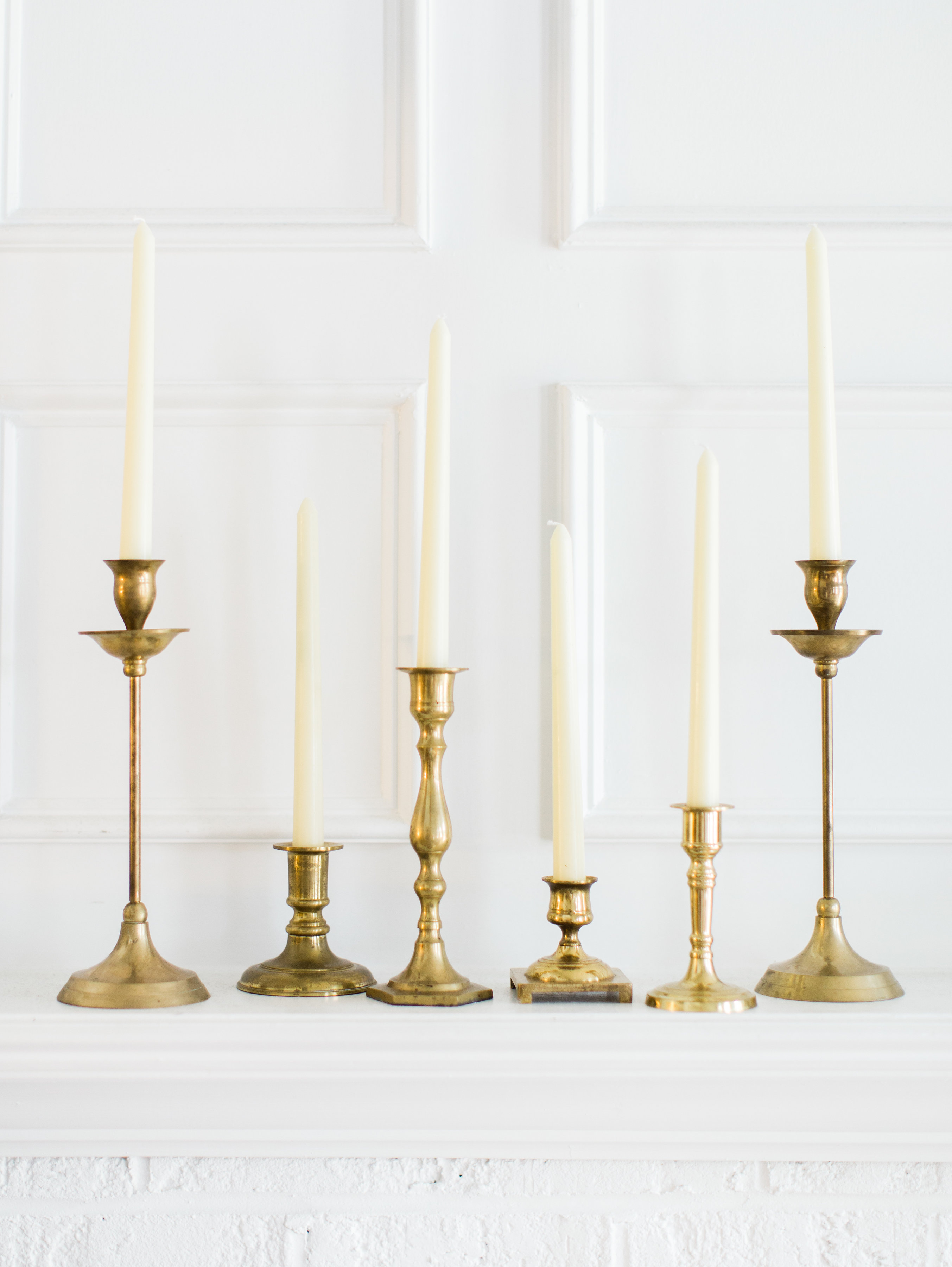 Lifestyle and Home blogger Lexi of Glitter, Inc. shares an awesome trick for finding great vintage home décor items - plus, the best places for thrifting - including how she stumbled upon these vintage brass candlestick holders for less than a dollar. Click through for the details. #vintage #brasscandlesticks #brasscandles #brasscandleholders #thrifting | glitterinc.com | @glitterinc