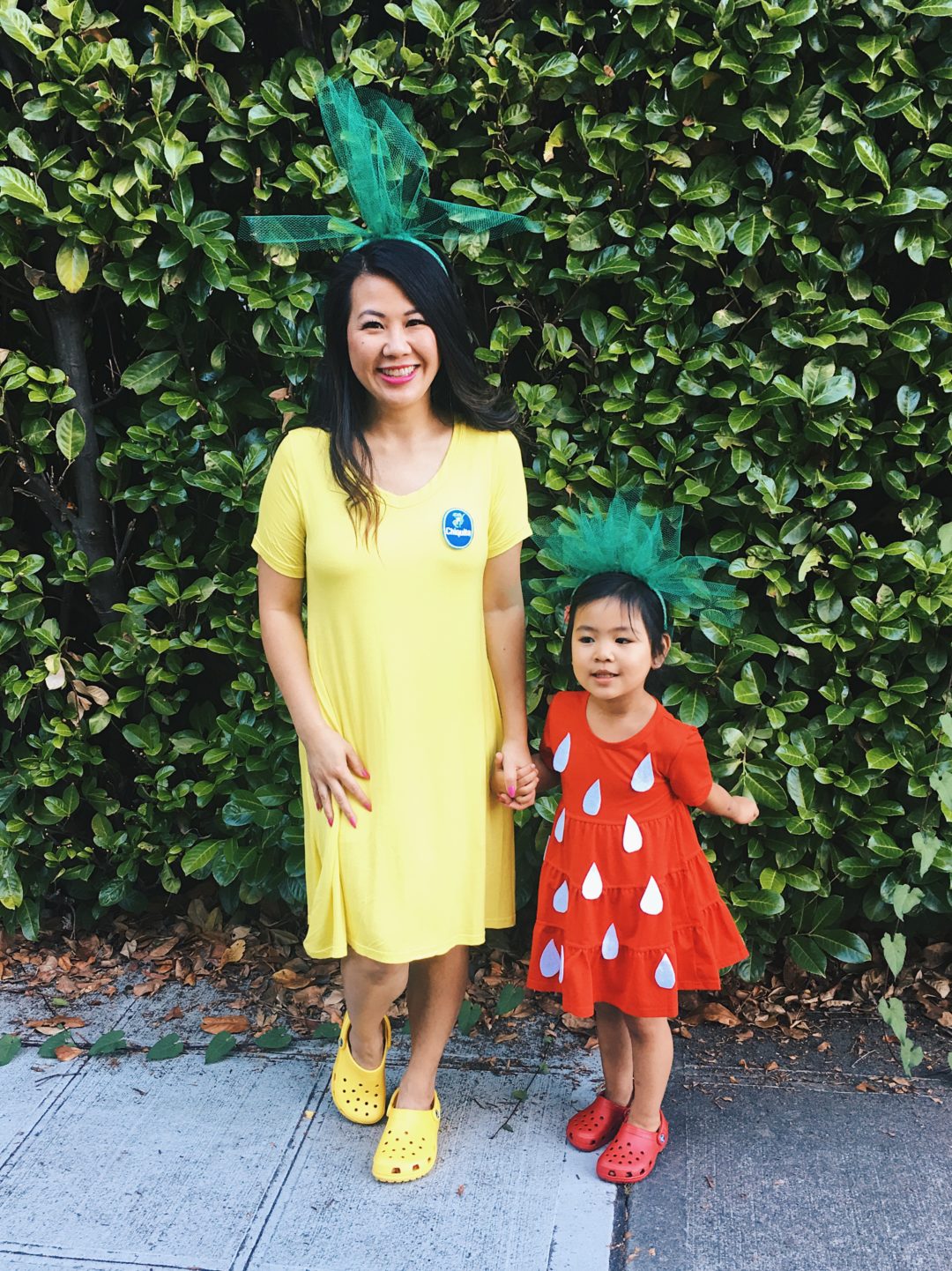 10 Adorably Awesome Halloween Costumes for Family, Kids, and Babies, including these DIY Mommy and Me Strawberry and Banana Halloween Costumes. Click through for plenty of fun DIY costumes for families. #halloween #halloweencostumeideas #familyhalloweencostume #familyhalloweencostumeideas | glitterinc.com | @glitterinc