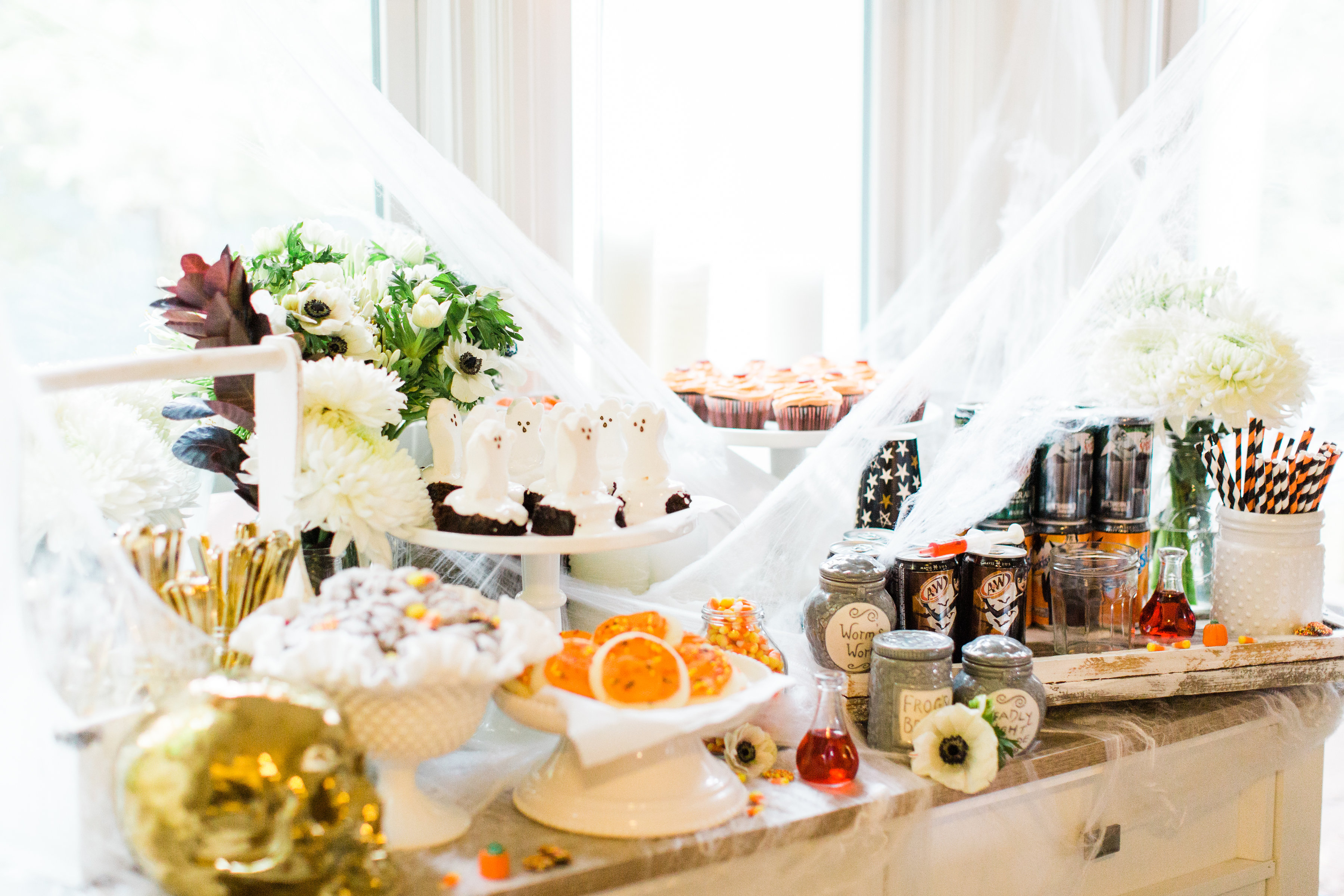 Create your own spooky Eat, Sip, and Be Scary Halloween Party Station for your next haunted bash! #Halloween #HalloweenParty #HalloweenDecor #halloweencandy #halloweendessert #dessertstation | glitterinc.com | @glitterinc