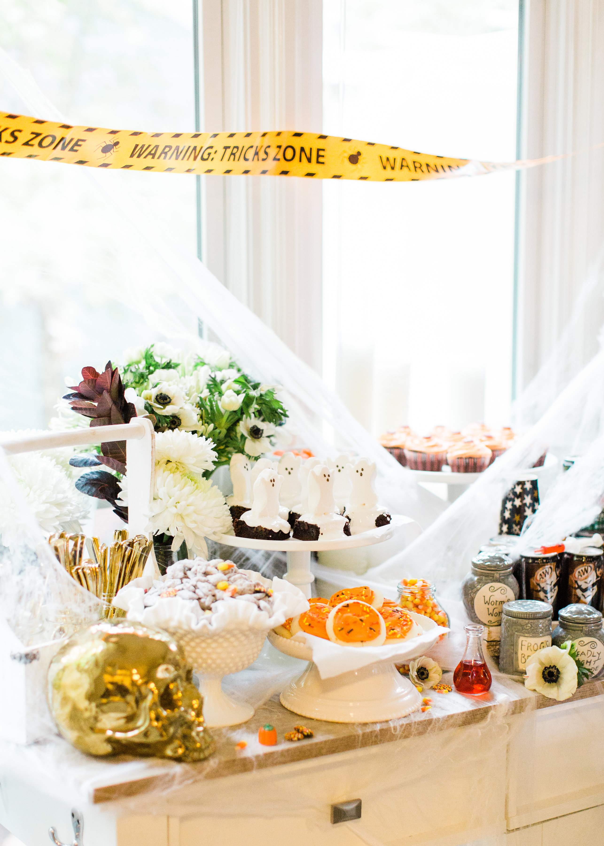 Create your own spooky Eat, Sip, and Be Scary Halloween Party Station for your next haunted bash! #Halloween #HalloweenParty #HalloweenDecor #halloweencandy #halloweendessert #dessertstation Click through for the scary fun details. | glitterinc.com | @glitterinc