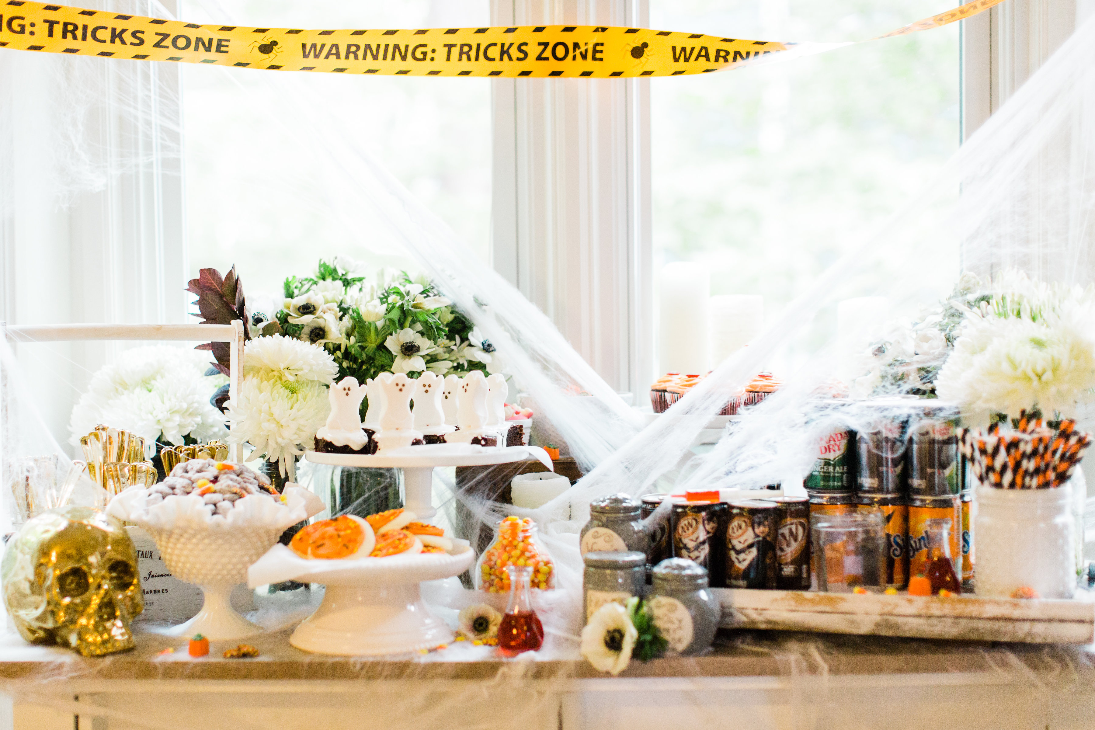 Create your own spooky Eat, Sip, and Be Scary Halloween Party Station for your next haunted bash! #Halloween #HalloweenParty #HalloweenDecor #halloweencandy #halloweendessert #dessertstation Click through for the scary fun details. | glitterinc.com | @glitterinc