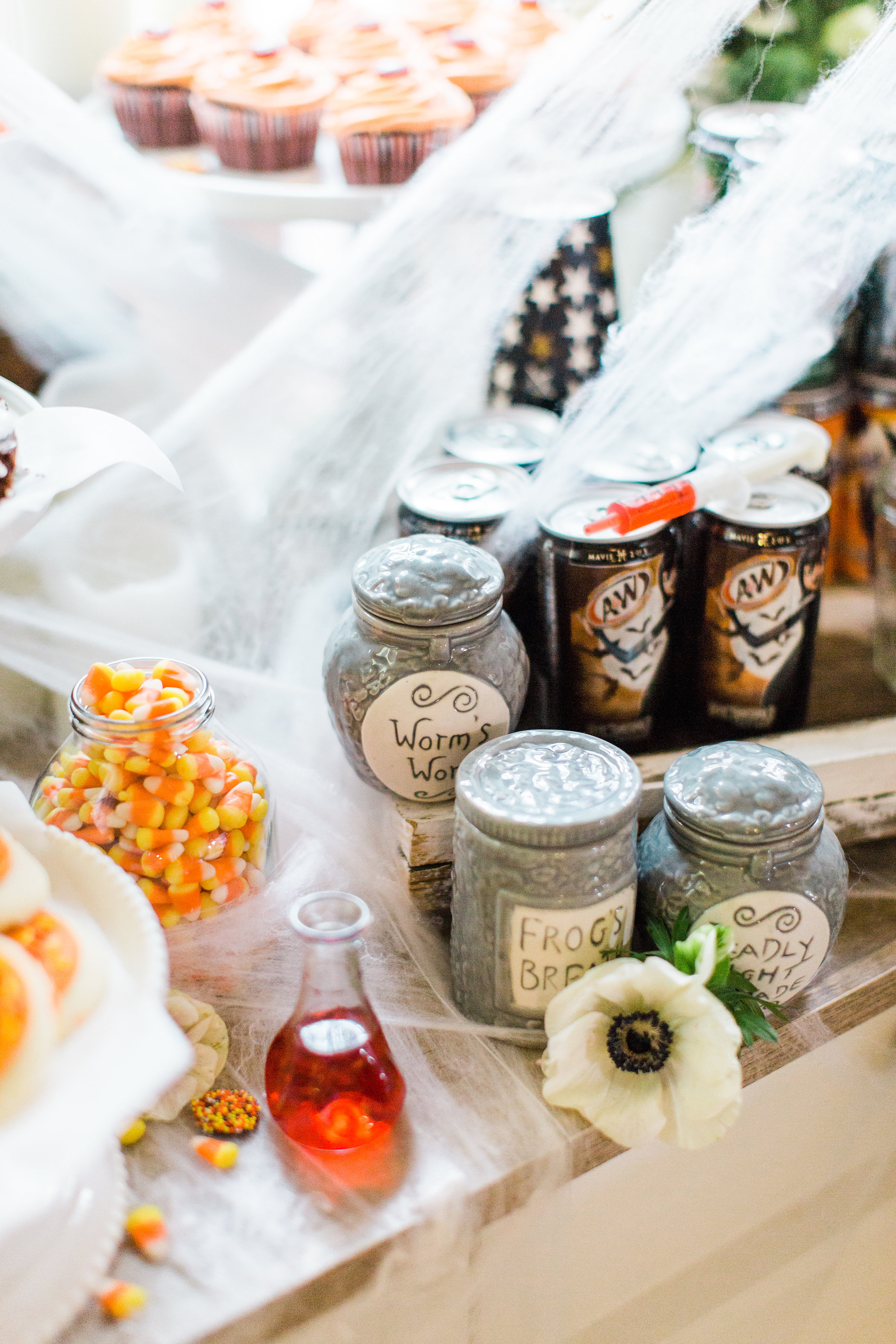 Create your own spooky Eat, Sip, and Be Scary Halloween Party Station for your next haunted bash! #Halloween #HalloweenParty #HalloweenDecor #halloweencandy #dessertstation Click through for the scary fun details. | glitterinc.com | @glitterinc