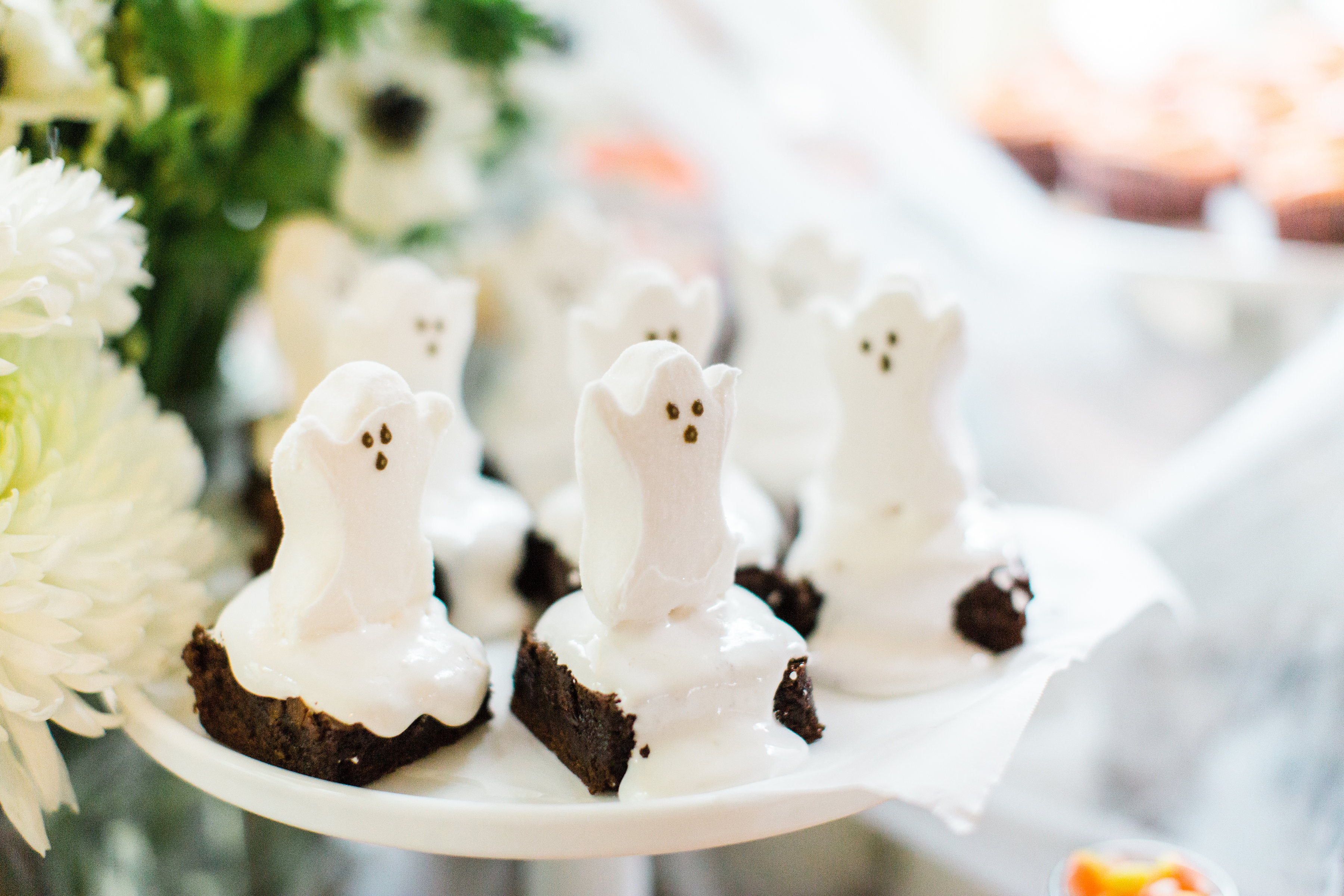 Create your own spooky Eat, Sip, and Be Scary Halloween Party Station for your next haunted bash! #HalloweenParty #HalloweenDecor #halloweencandy #halloweendessert #dessertstation Click through for the scary fun details. | glitterinc.com | @glitterinc