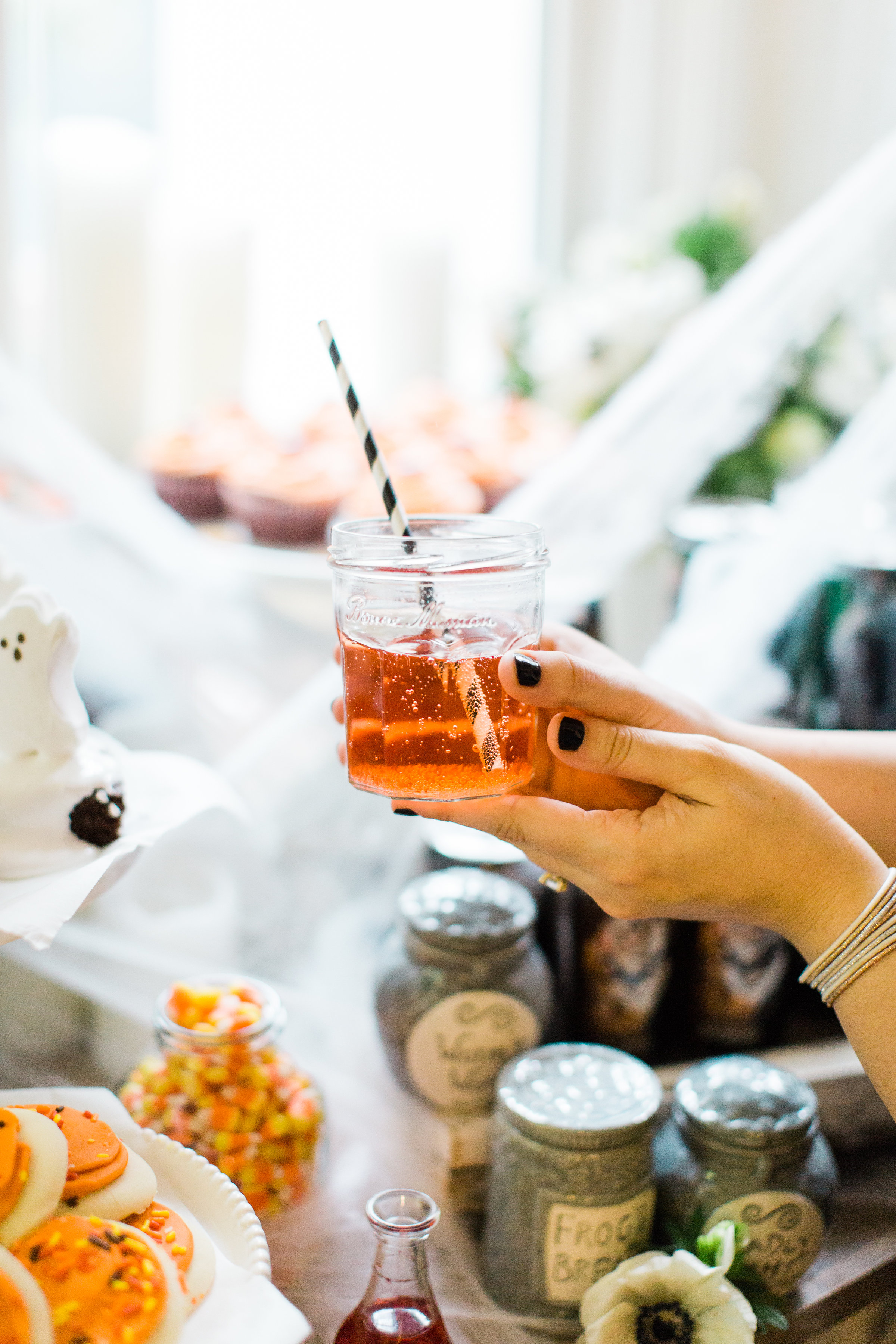 Create your own spooky Eat, Sip, and Be Scary Halloween Party Station for your next haunted bash! #Halloween #HalloweenParty #halloweencandy #halloweendessert #dessertstation Click through for the scary fun details. | glitterinc.com | @glitterinc