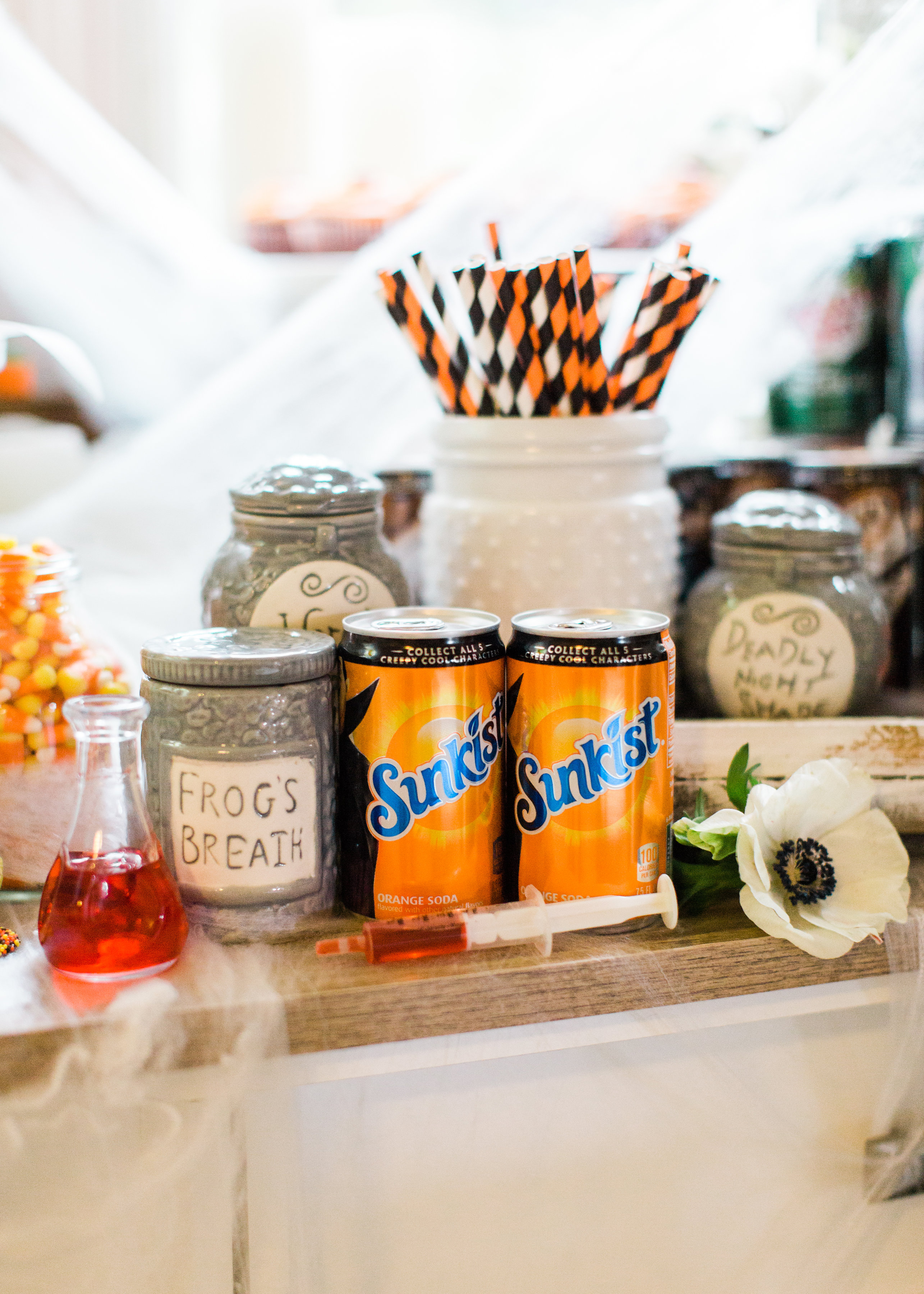 Create your own spooky Eat, Sip, and Be Scary Halloween Party Station for your next haunted bash! #Halloween #HalloweenParty #HalloweenDecor #halloweencandy #halloweendessert #dessertstation Click through for the scary fun details. | glitterinc.com | @glitterinc