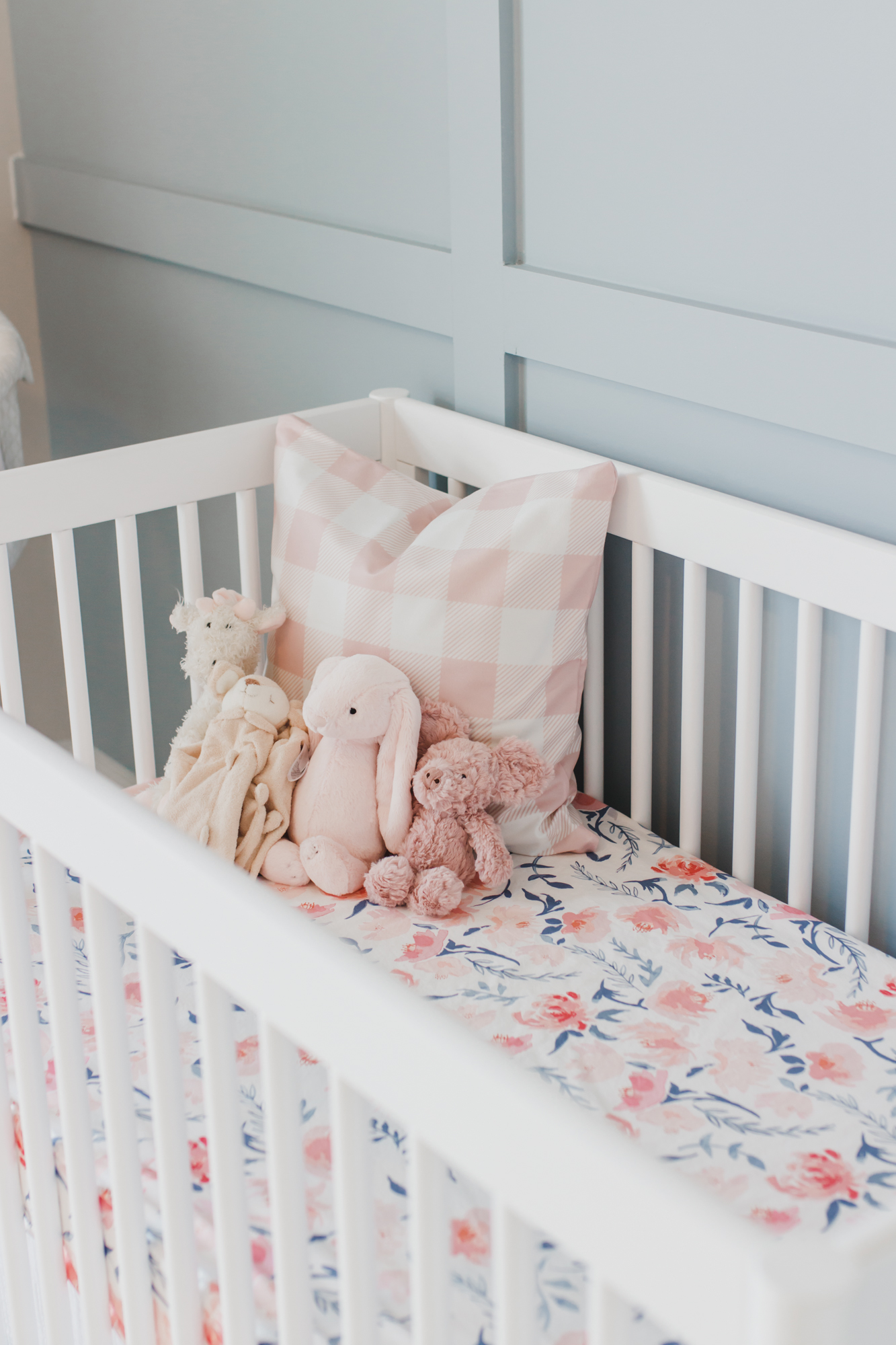 Step inside this gorgeous baby girl's nursery in soft blue and blush tones. Click through for the details. #nursery #babygirl #girlsroom #girlsnursery #girlnursery #girlroom #baby #newbaby | glitterinc.com | @glitterinc