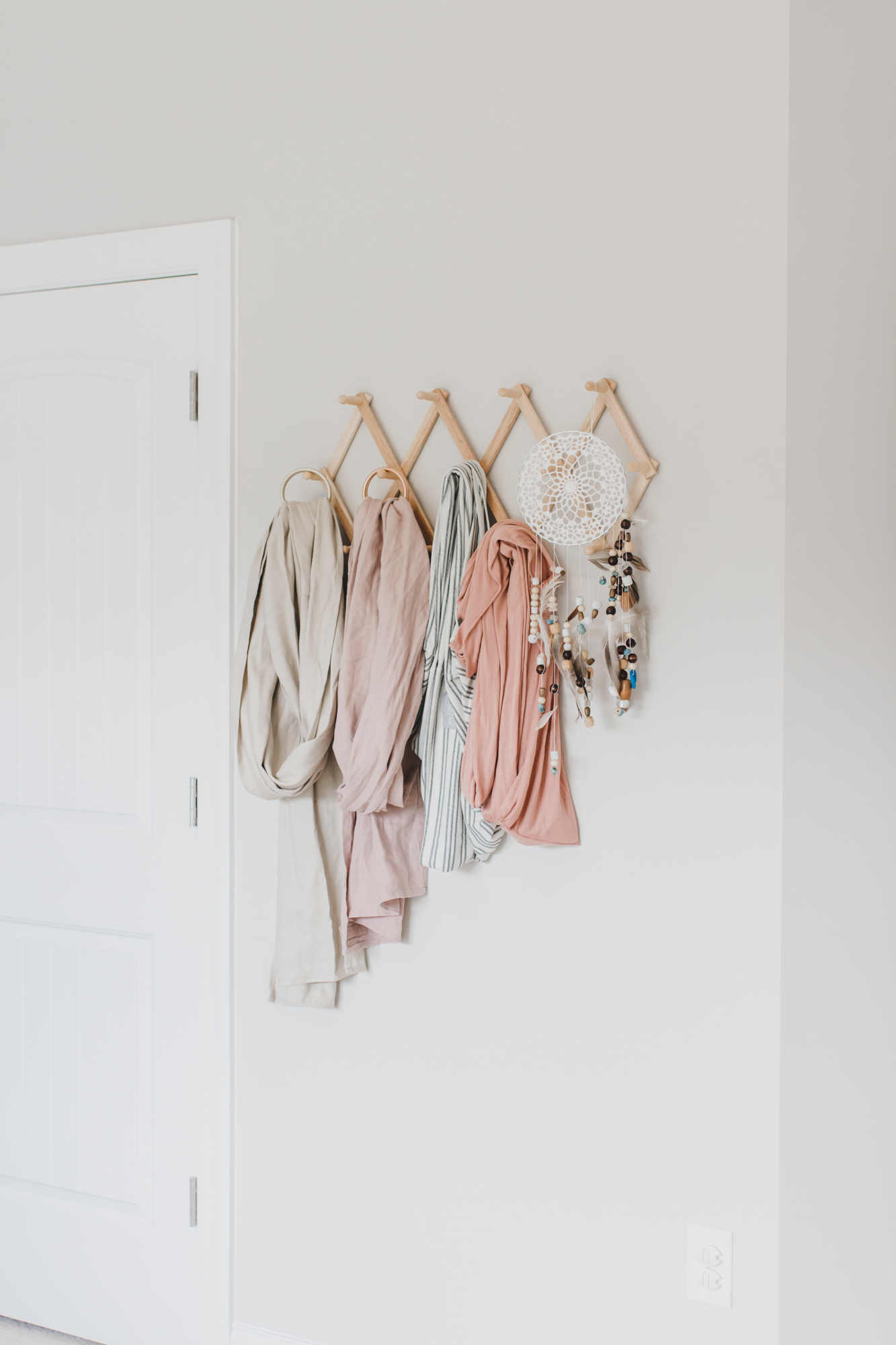 Step inside this gorgeous baby girl's nursery in soft blue and blush tones. Click through for the details. #nursery #babygirl #girlsroom #girlsnursery #girlnursery #girlroom #baby #newbaby | glitterinc.com | @glitterinc