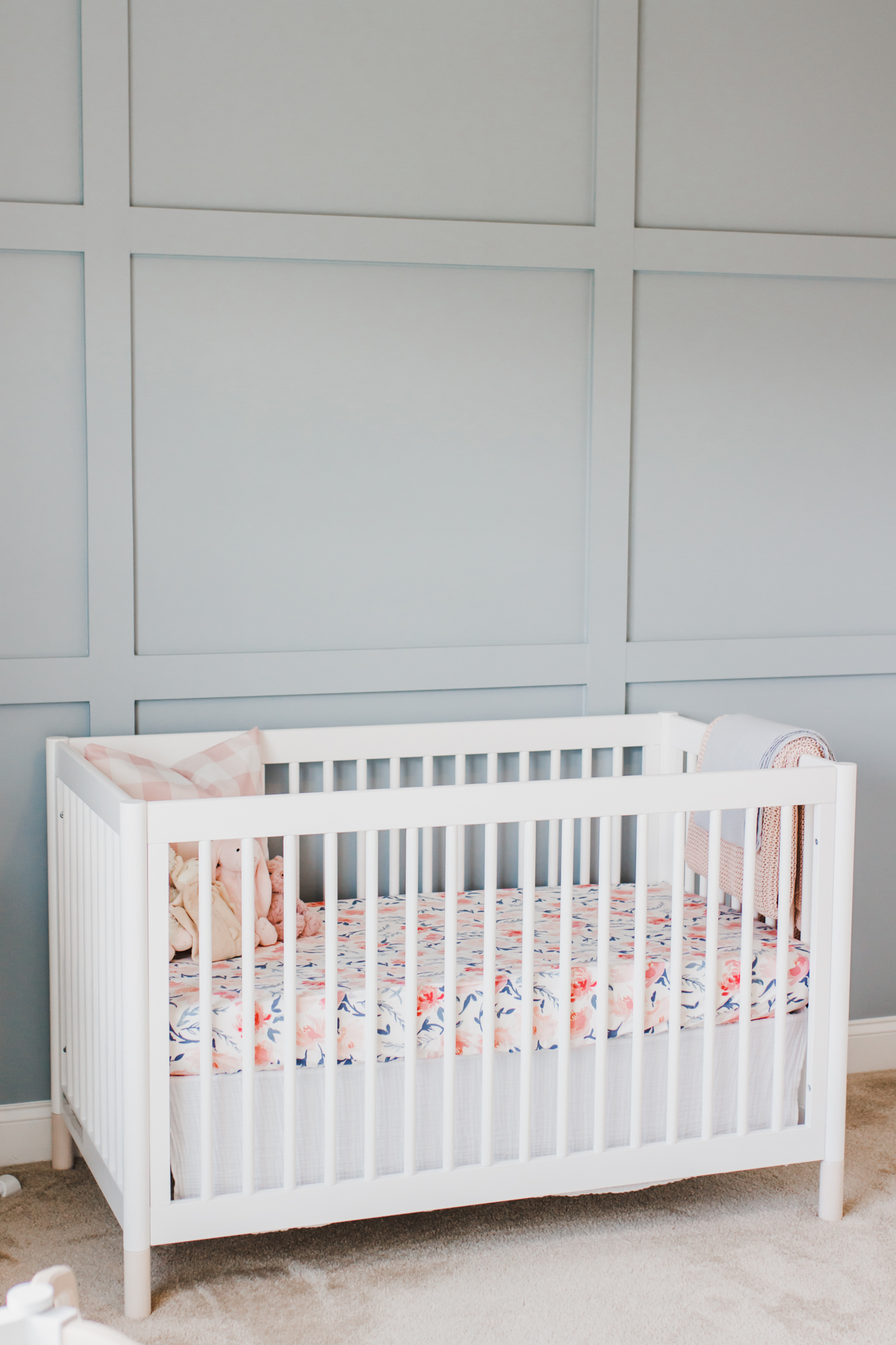 Step inside this gorgeous baby girl's nursery in soft blue and blush tones. Click through for the details. #nursery #babygirl #girlsroom #girlsnursery #girlnursery #girlroom #baby #newbaby | glitterinc.com | @glitterinc