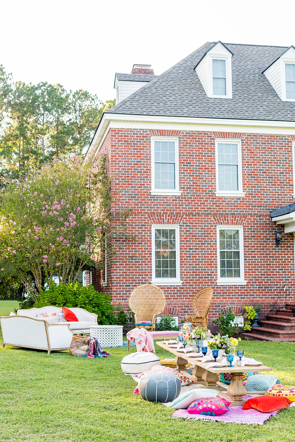 Step inside this colorful outdoor bohemian thirtieth birthday party. Full of color, lush garden flowers, and the yummiest vegan unicorn confetti cakes you ever did find! Click through for the details. Mikkel Paige Photography #gardenparty #birthdayparty #bohemianparty #unicornparty #styledshoot #backyardparty #flowers | glitterinc.com | @glitterinc